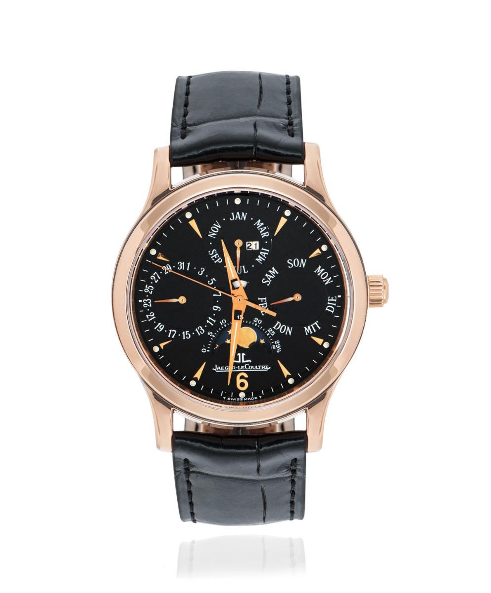 A 37mm Master Control Perpetual Calendar in rose gold by Jaeger LeCoultre. Features a black dial with displays of the moon phases, the day, the date, month and year. Just above the centre of the dial is a day/night indicator.

An original brand new