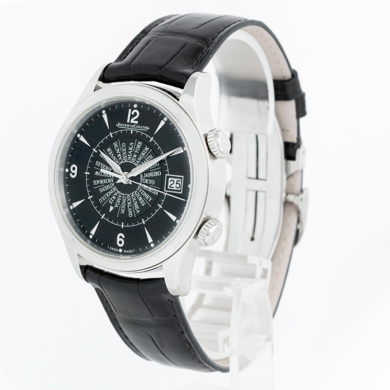 Jaeger-LeCoultre Master Memovox International  Men's Watch  Q1418471 - Automatic winding. Stainless steel case  (40mm diameter). Black dial with silver-tone hands and index hour markers. Arabic numerals mark the 6, 9 and 12 o'clock positions. Minute