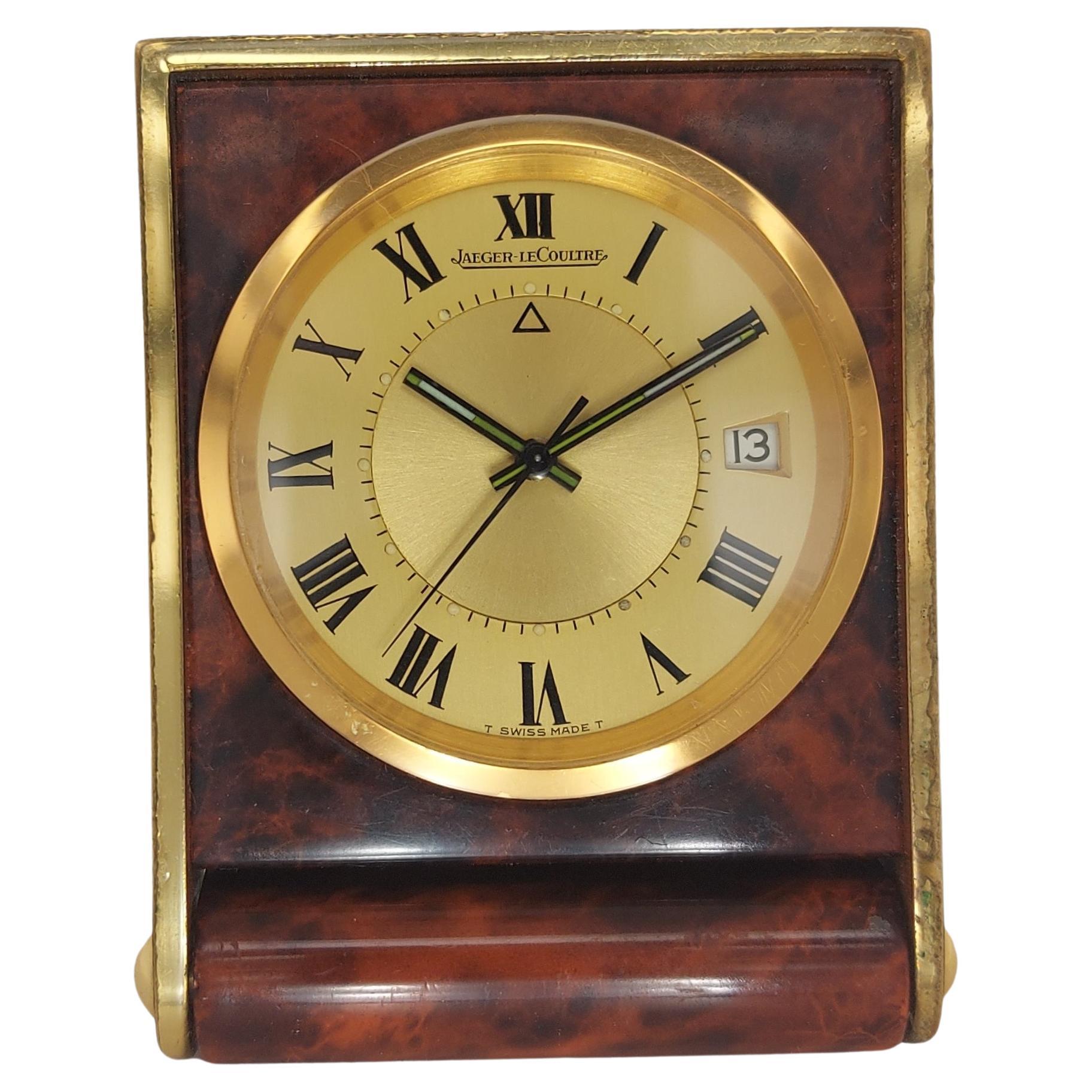 Fantastic Collectors Item Jaeger-LeCoultre Memovox Calendrier alarm clock

The movement is the same K911 calibre that is used in some of their wrist watches, so you get an alarm clock with KIF shock protection

You have two crowns, one sets and