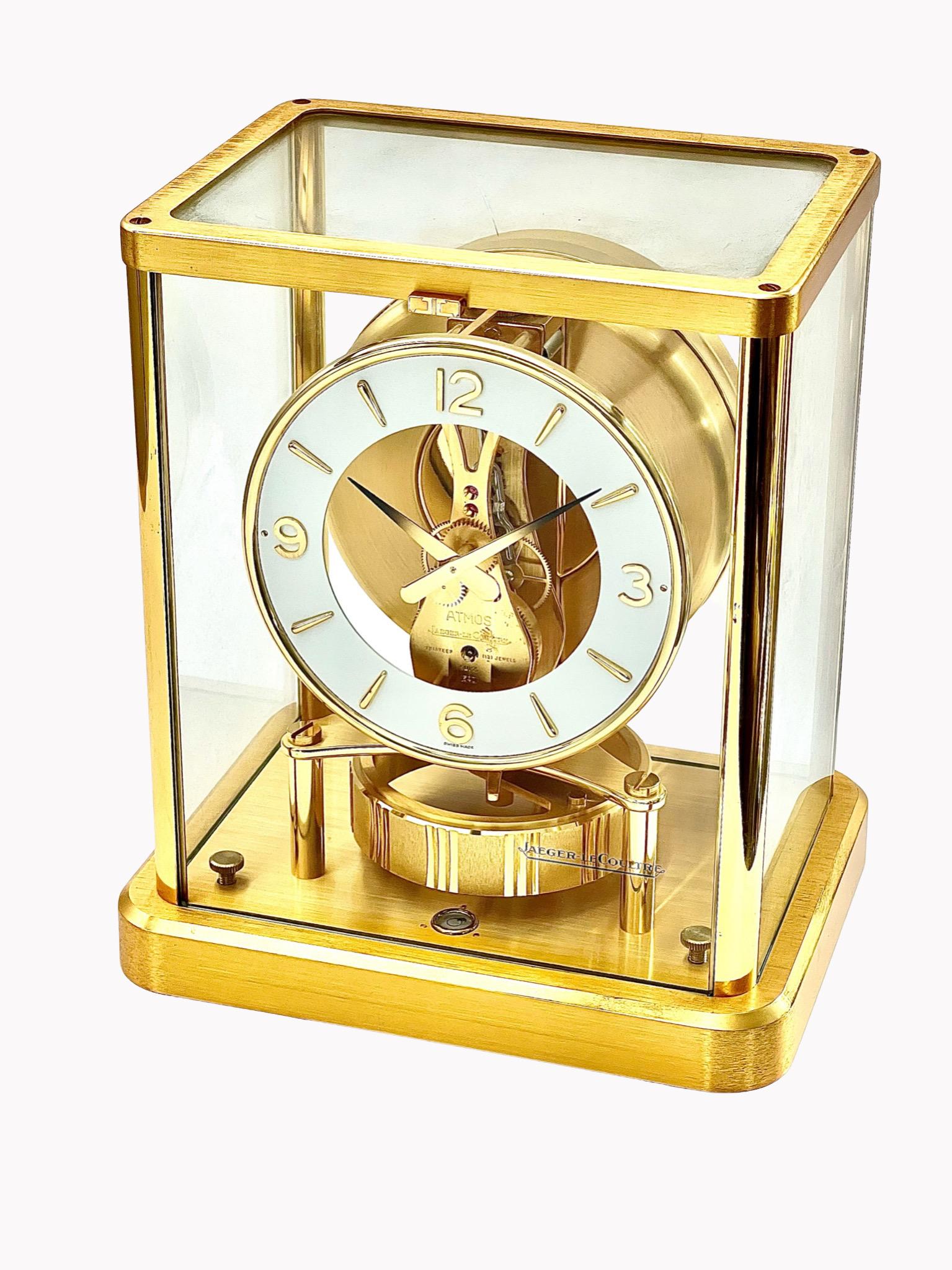 A stunning mid century Jaeger LeCoultre gilt brass Atmos clock with circular dial. This is the current model 540. With it’s glass case, the Atmos clock’s unique design allows the owner to see the complexity of the machinery from all angles. As with
