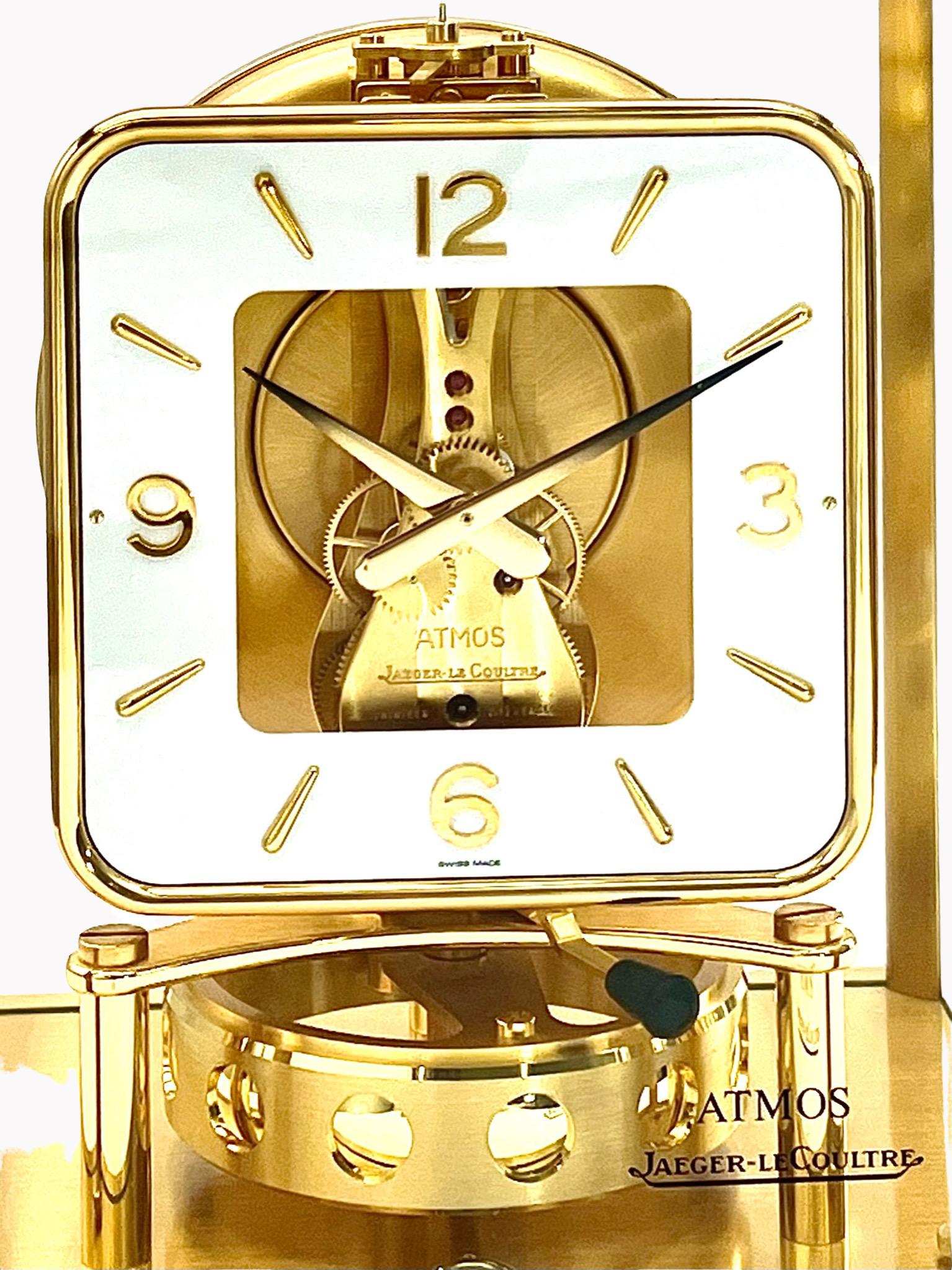 A stunning mid-century Jaeger LeCoultre Atmos clock model 544, with a stylish square dial with rounded edges. In its glass case, the Atmos clock’s unique design allows the owner to see the complexity of the machinery from all angles. As with all