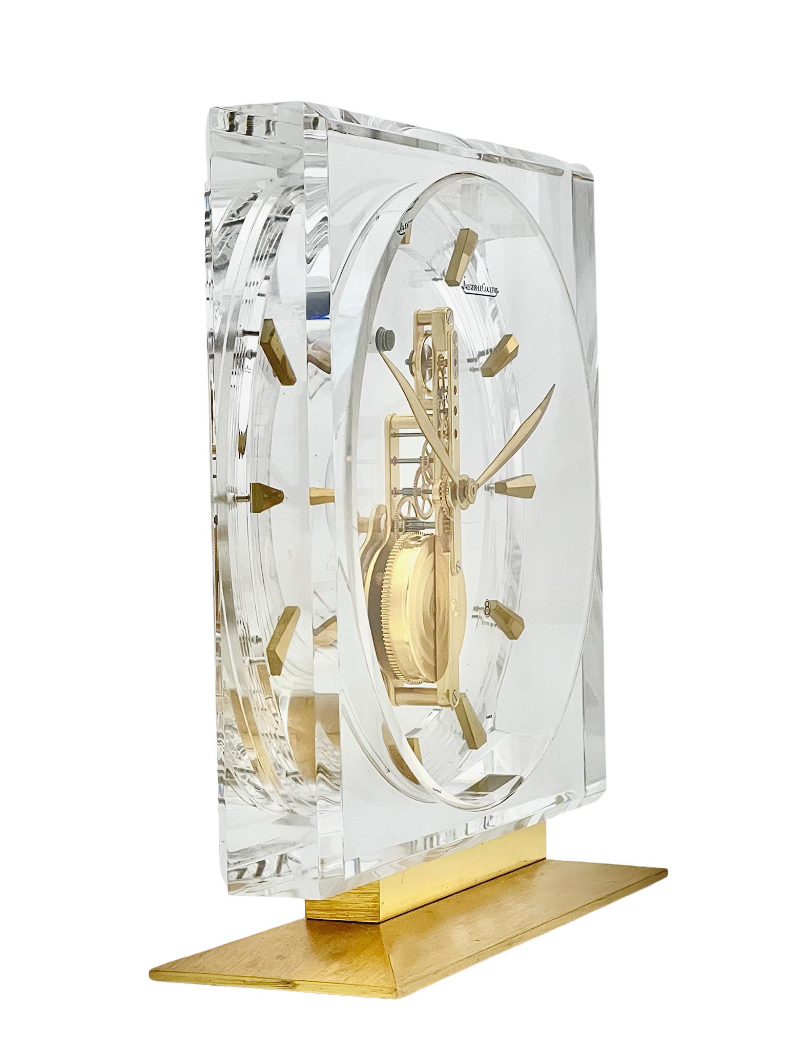 A stunning lucite and brass Jaeger LeCoultre Inline Skeleton Clock, with a clean minimalistic design which would look stylish in any setting. The beauty of these skeleton clocks is that you can see the 16 jewel Swiss movement working and watch the