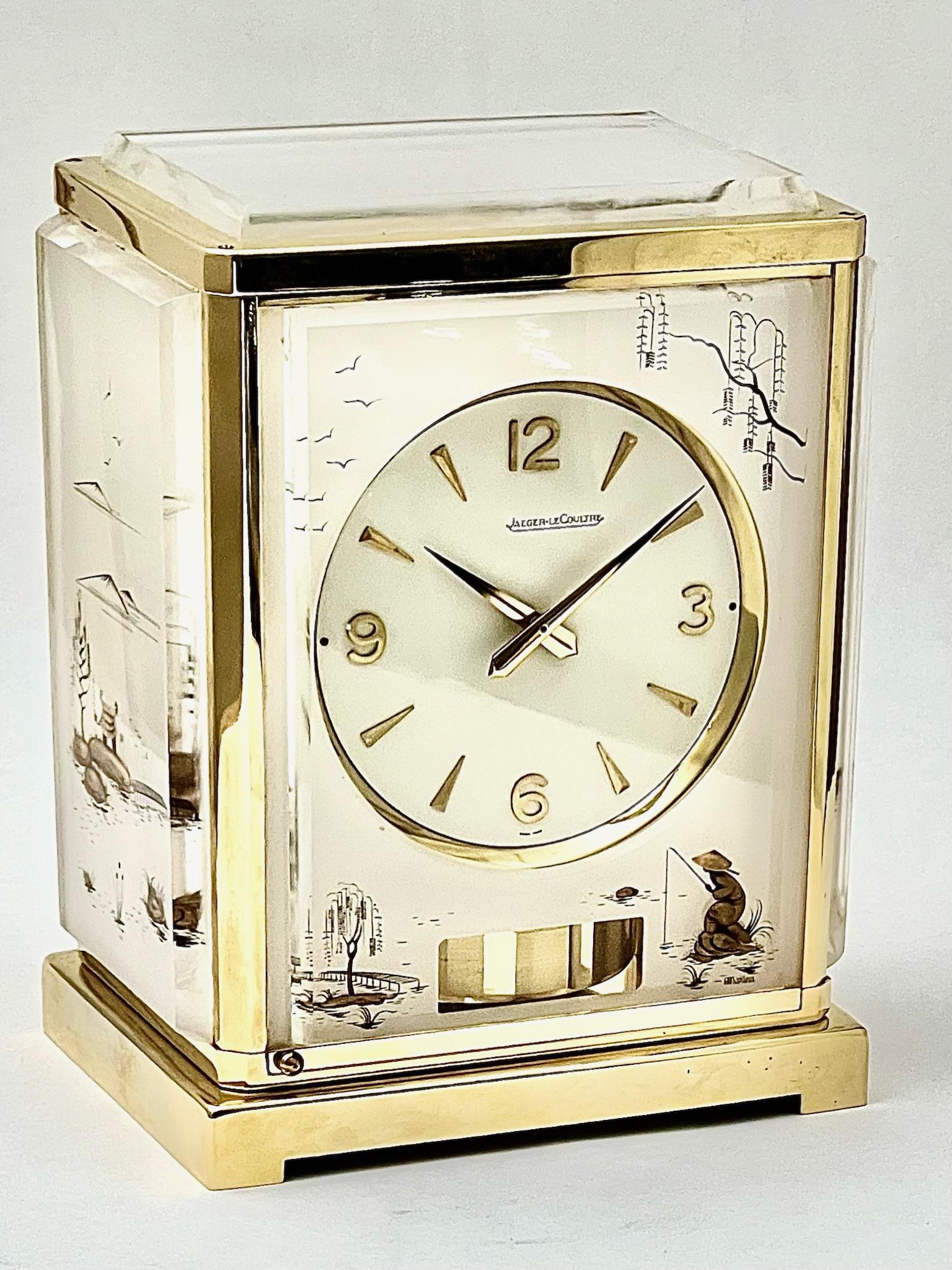 A stunning Jaeger LeCoultre mid century Marina Atmos clock with an Oriental fisherman theme. This piece looks wonderful on a desk in a study, or on a mantelpiece or table.

Nicknamed the 'President’s Clock,' Atmos clock are genuine icons of style