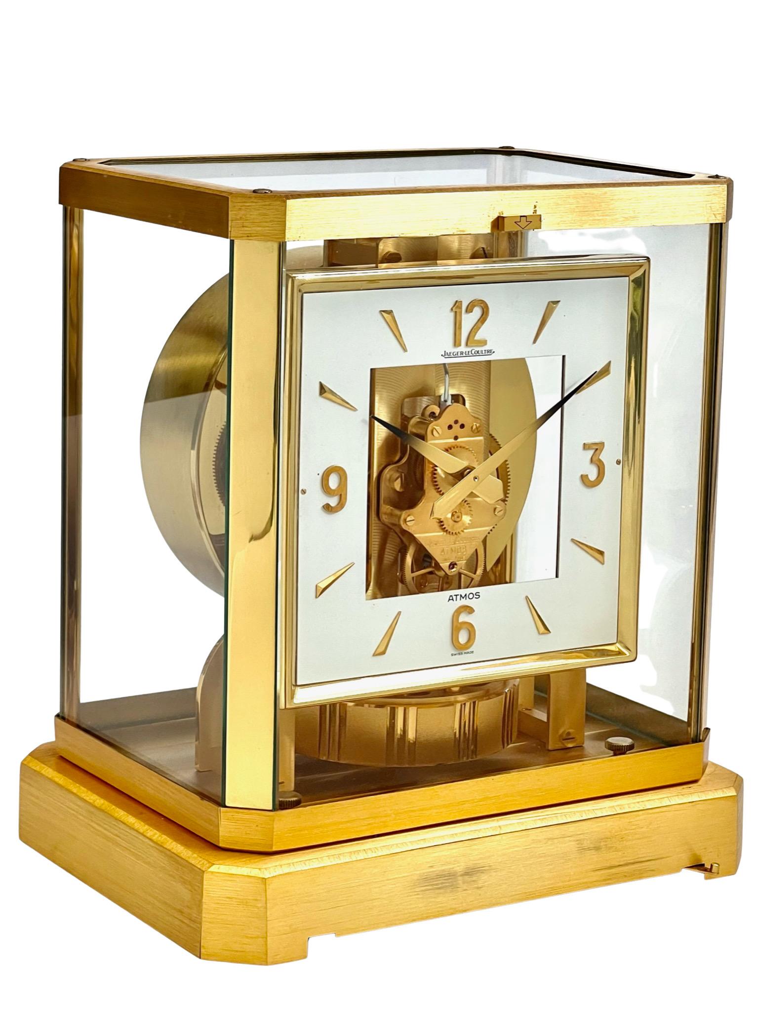 A stunning Mid Century Jaeger LeCoultre Atmos clock with the rare square dial. Serial Number 484155, Caliber 528-8.

In its glass case, the Atmos clock’s unique design allows the owner to see the complexity of the machinery from all angles. As