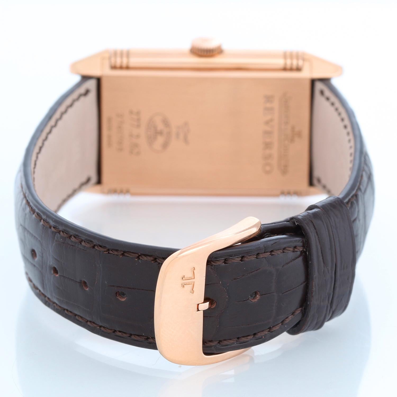 Jaeger - LeCoultre Reverso 18k Rose Gold Men's Watch 227.2.62 - Manual winding. 18k rose gold Reverso case  (27mm x 45mm). Silver dial with black Arabic numerals; reverses to a solid case. Brown Jaeger-LeCoultre alligator strap and 18k rose gold