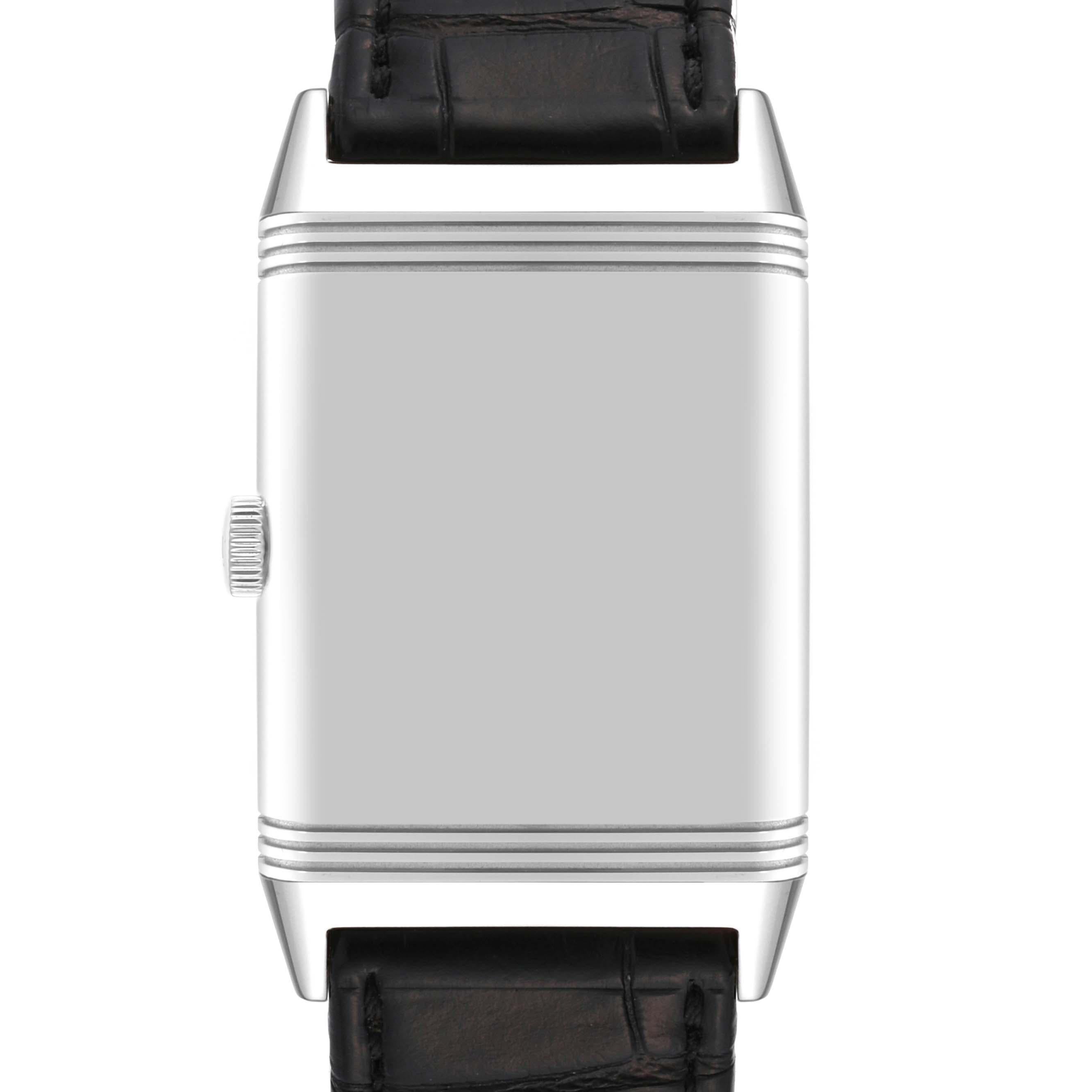 Jaeger LeCoultre Reverso Classic Medium Steel Mens Watch 213.8.62 Q2438520 Card. Manual winding movement. Stainless steel 25.5 x 35.5 mm rectangular case with reeded ends rotating within its back plate. Stainless steel bezel. Scratch resistant