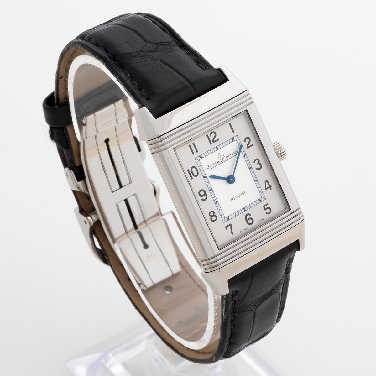 Our Jaeger-LeCoultre Reverso Classic reference 252.8.47 features a mid size 33 x 23mm case of stainless steel, quartz movement and its original black leather strap (with some wear) with deployant steel clasp. Presented in excellent condition with