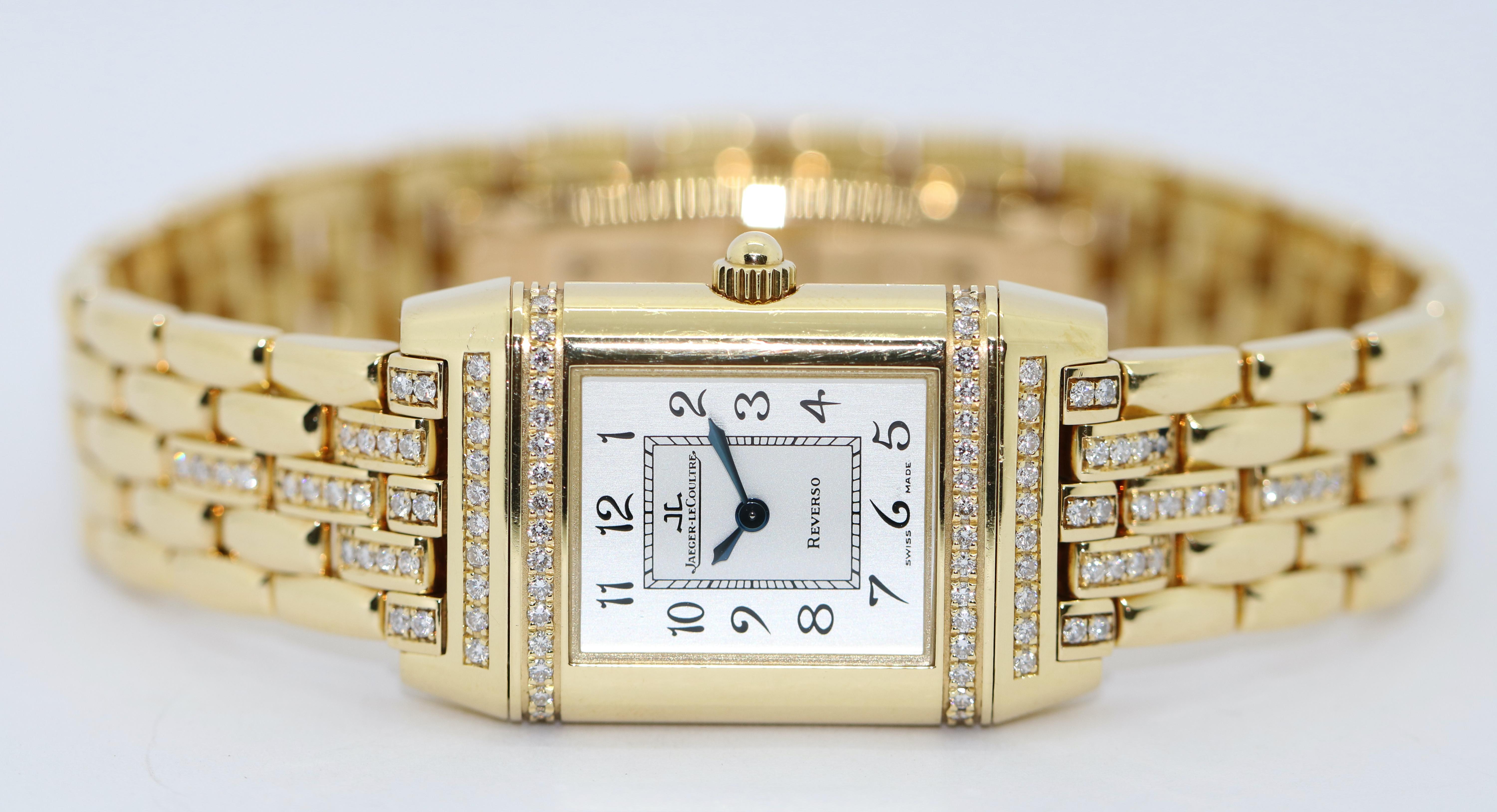 Fantastic JLC Reverso ladies wristwatch.
Strap and Case made of solid 18K Gold.
Strap and case (on both sides) set with original diamonds.

From first owner.
Quartz movement.

Dimension of case (without crown) 21mm x 33mm

Including certificate of