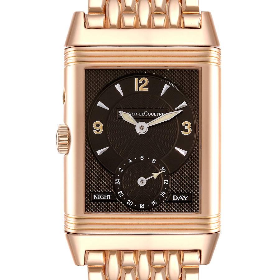 Jaeger LeCoultre Reverso Duo Day Night Rose Gold Watch 270.2.54 Q2702121. Manual winding movement. 18K rose gold five-body 42.0 x 26.5 mm case rectangular rotating case. Push button on the case band for second time zone. 18K rose gold reeded bezel.