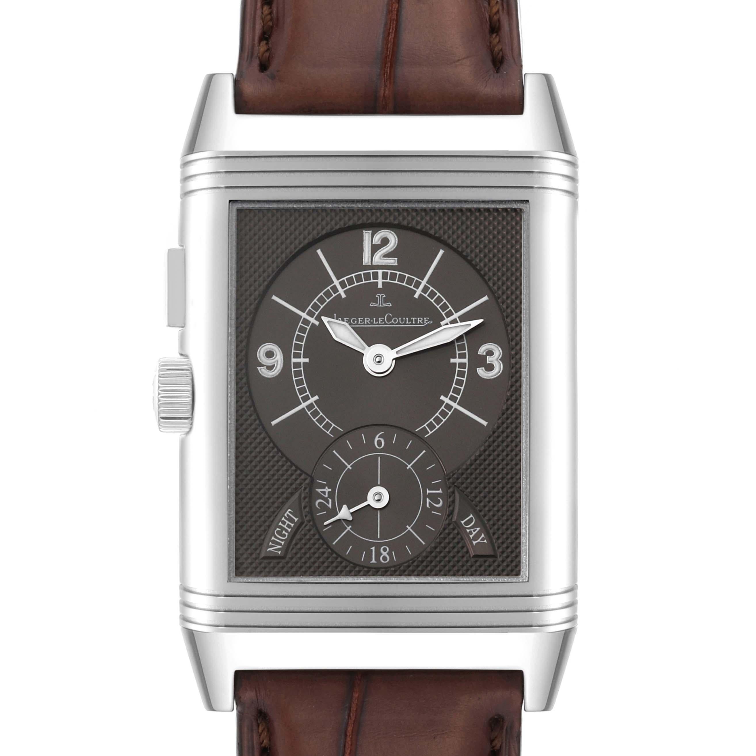 Jaeger LeCoultre Reverso Duo Day Night Steel Mens Watch 272.8.54 Q2718410. Manual winding movement. Stainless steel five-body 42 mm x 26 mm rectangular rotating case. Stainless steel reeded bezel. Scratch resistant sapphire crystal. (1) Silver dial