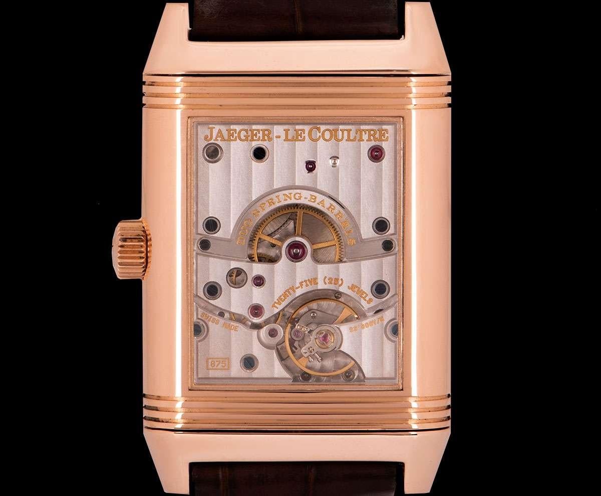 A 29 mm 18k Rose Gold Reverso Grande Date 8 Day Power Reserve Gents Wristwatch, silver guilloche dial with arabic numbers, small seconds at 5 0'clock, date apertures at 7 0'clock, 8 days power reserve display between 10 and 12 0'clock, a fixed 18k