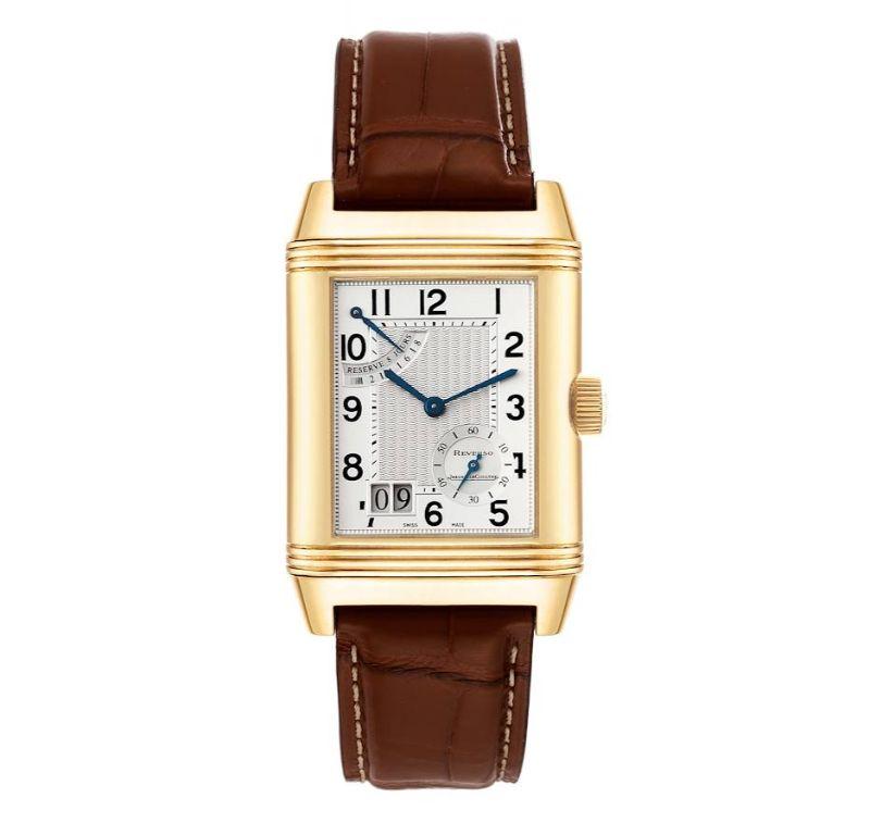 Jaeger LeCoultre Reverso Grande Date 8 Day Yellow Gold Watch 240.1.15 Q3001420. Manual winding movement. Rhodium-plated, fausses cotes decoration, straight line lever escapement, monometallic balance, shock-absorber, self-compensating flat