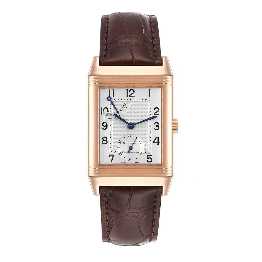 Jaeger LeCoultre Reverso Rose Gold Mens Watch 270.2.13 Q2702420. Manual winding movement. 18K rose gold 42.0 x 26.0 mm case rectangular rotating case. . Scratch resistant sapphire crystal. Silver guilloche dial with Arabic numerals. Blued steel