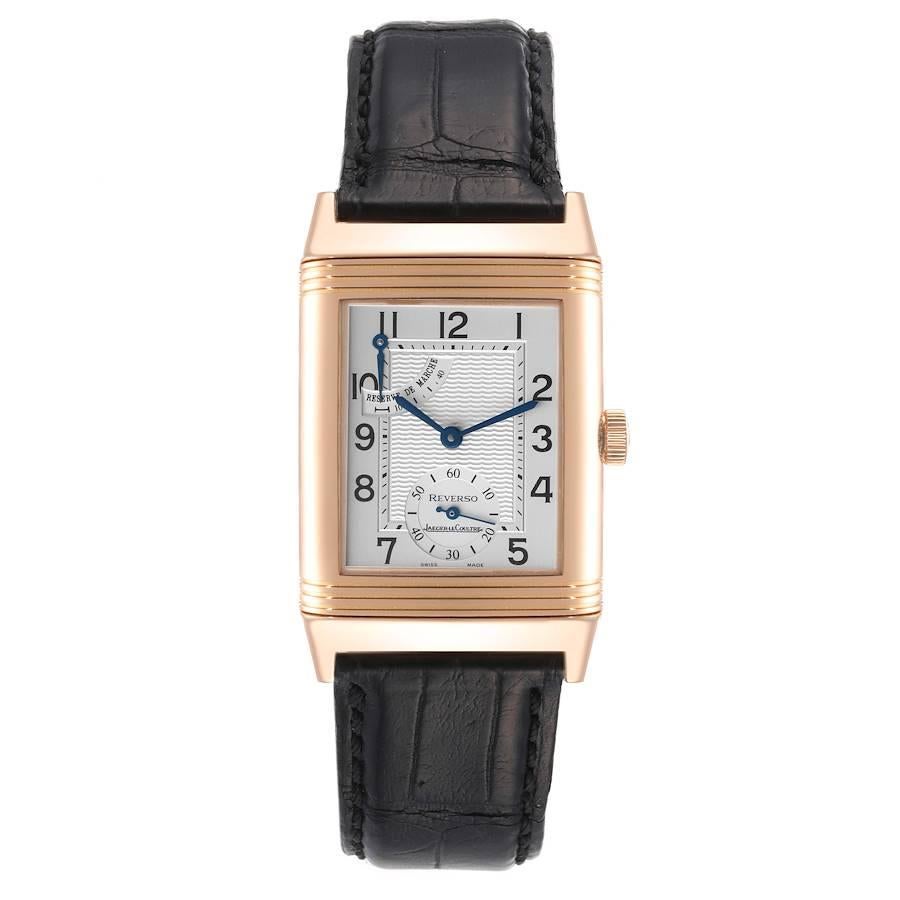 Jaeger LeCoultre Reverso Rose Gold Silver Dial Mens Watch 270.2.13 Q2702420. Manual winding movement. 18K rose gold 42.0 x 26.0 mm case rectangular rotating case. 18K rose gold ribbed bezel. Scratch resistant sapphire crystal. Silvered matte dial,