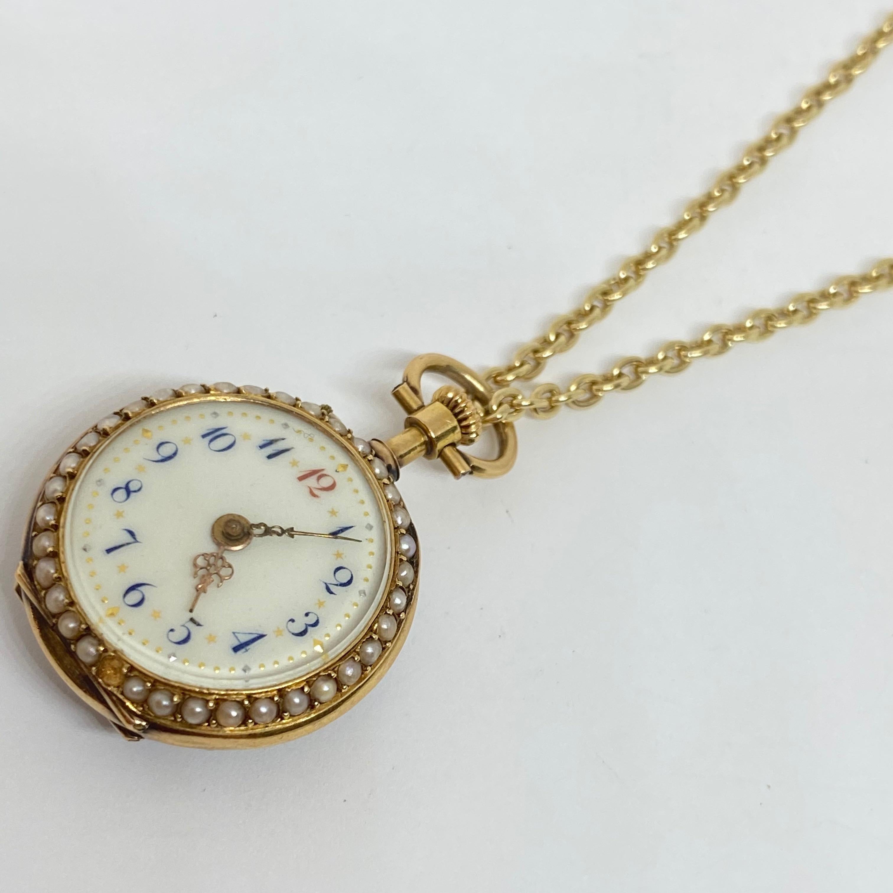 Enamel Portrait Pocket Watch measures 25mm in 18K yellow gold. Beautiful tiny Jaeger LeCoultre lady's pocket or necklace watch with enamel portrait of lady on back surrounded by natural seed pearl border, dial is porcelain with blue Arabic numerals,