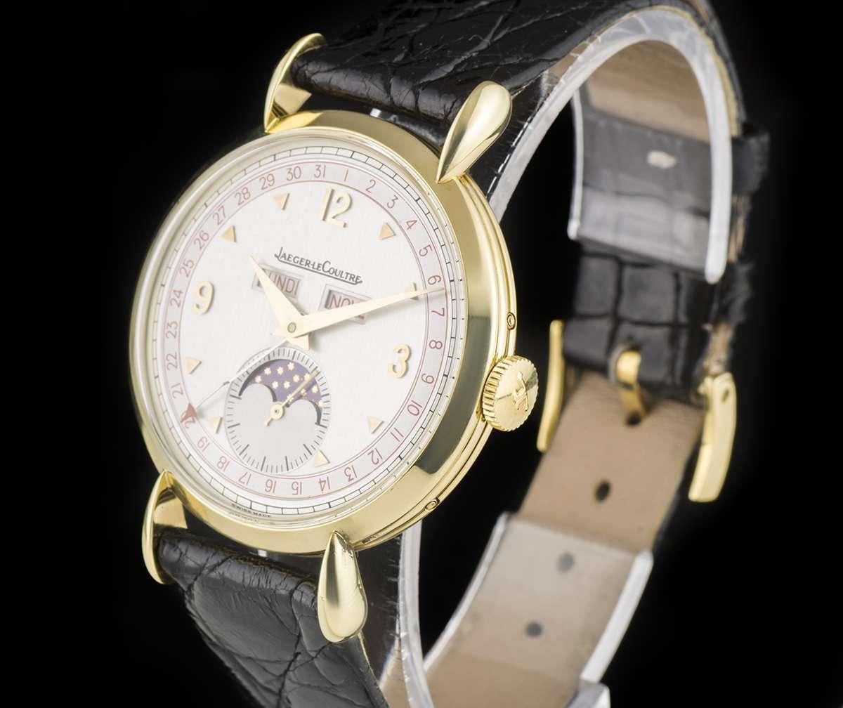 A 36 mm 18k Yellow Gold Triple Date Vintage Gents Wristwatch, silver dial with applied hour markers and applied arabic numbers at 3, 9 and 12 0'clock, small seconds and moonphase aperture at 6 0'clock, weekday and month apertures at 12 0'clock, date