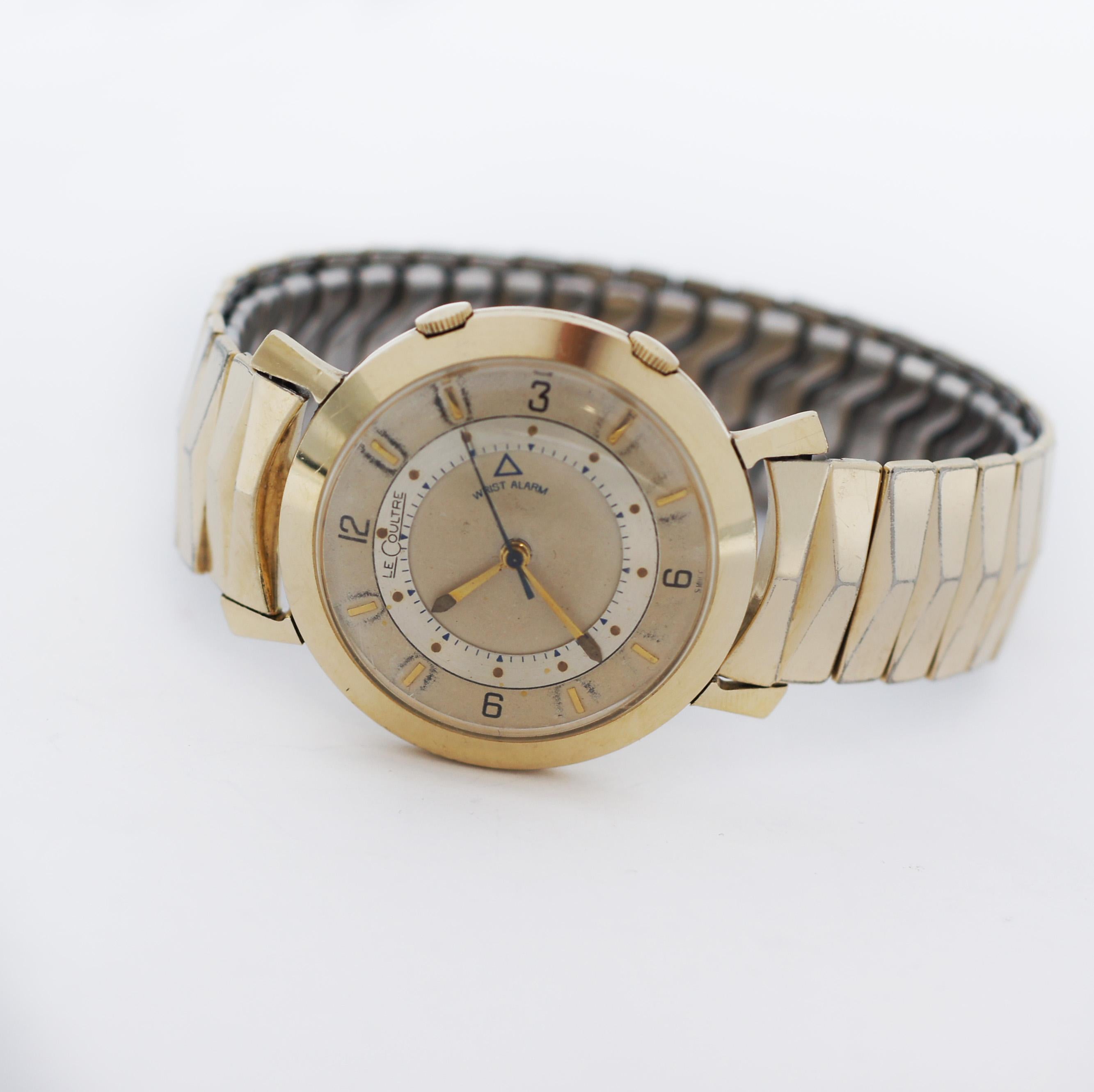 Jaeger LeCoultre

Vintage

Men’s wristwatch

Wrist Alarm

10k gold filled case

Case approx. 34mm

2 tone dial

golden & black numeral markers

Acrylic Crystal

LeCoultre Mechanical movement

hand-wind

Stretch Band 10 GF / Stainless Steel