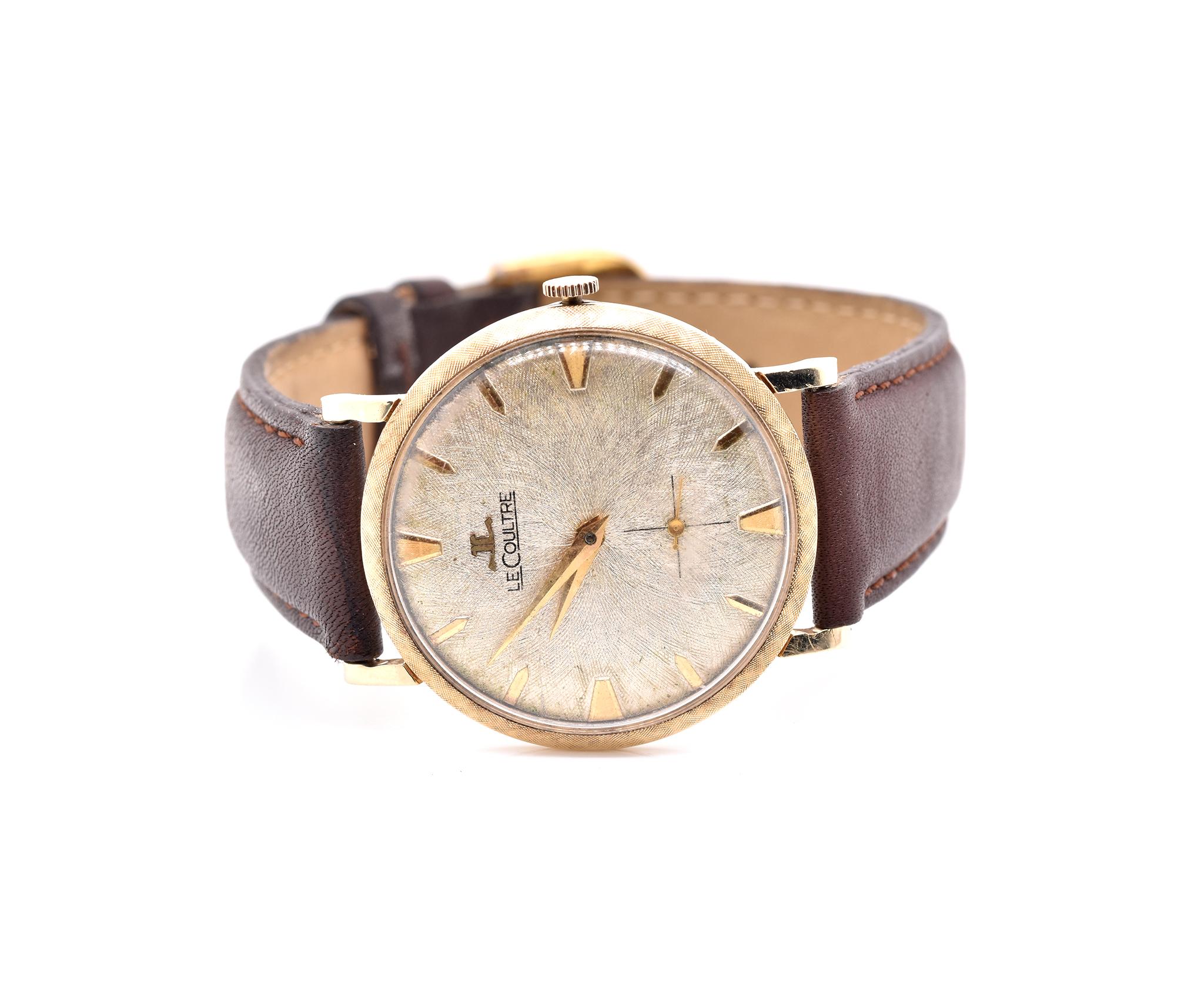 Movement: manual
Function: hours, minutes, seconds
Case: 32mm 14K yellow gold round case, acrylic crystal, push/pull crown
Dial: silver dial, gold hands, stick hour markers
Band: brown leather strap with buckle
Reference #: Vintage Gents
Case Serial