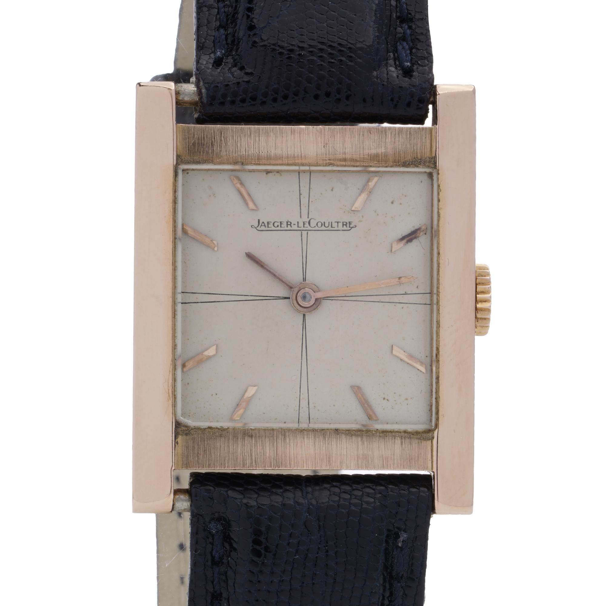 Jaeger-LeCoultre vintage 18kt Yellow Gold Manual Wristwatch.
Made in Circa 1950 - 1960s.

This wristwatch by Jaeger-LeCoultre is crafted in 18kt yellow gold, offering an elegant rectangular case and a minimalist silver-tone dial. The watch features