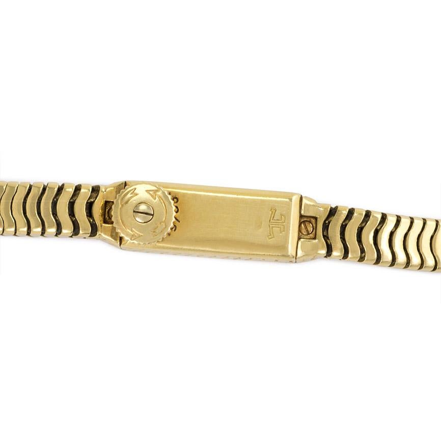 A Retro gold box-chain watch bracelet, in 18k.  Jaeger-LeCoultre.  Mechanical movement, Caliber 101 - their smallest back-winder movement ever produced.  First introduced in 1929; very limited production due to its complexity