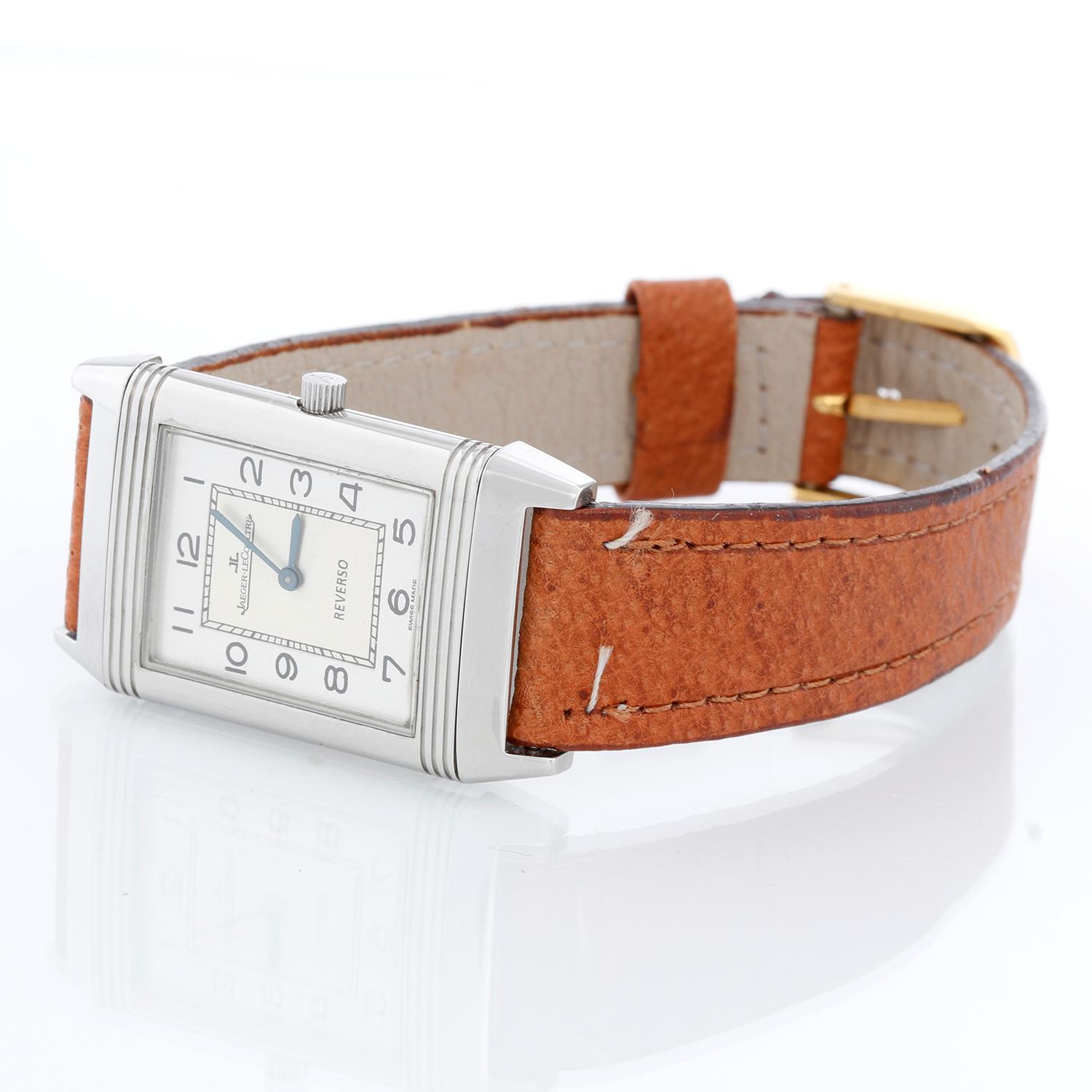 Jaeger Reverso Silver Dial Mens Watch 2500.8.86 - Manual widning. Stainless steel case ( 23 x 39 mm ). Silver Dial. Brown strap with buckle. Pre-owned with custom box.