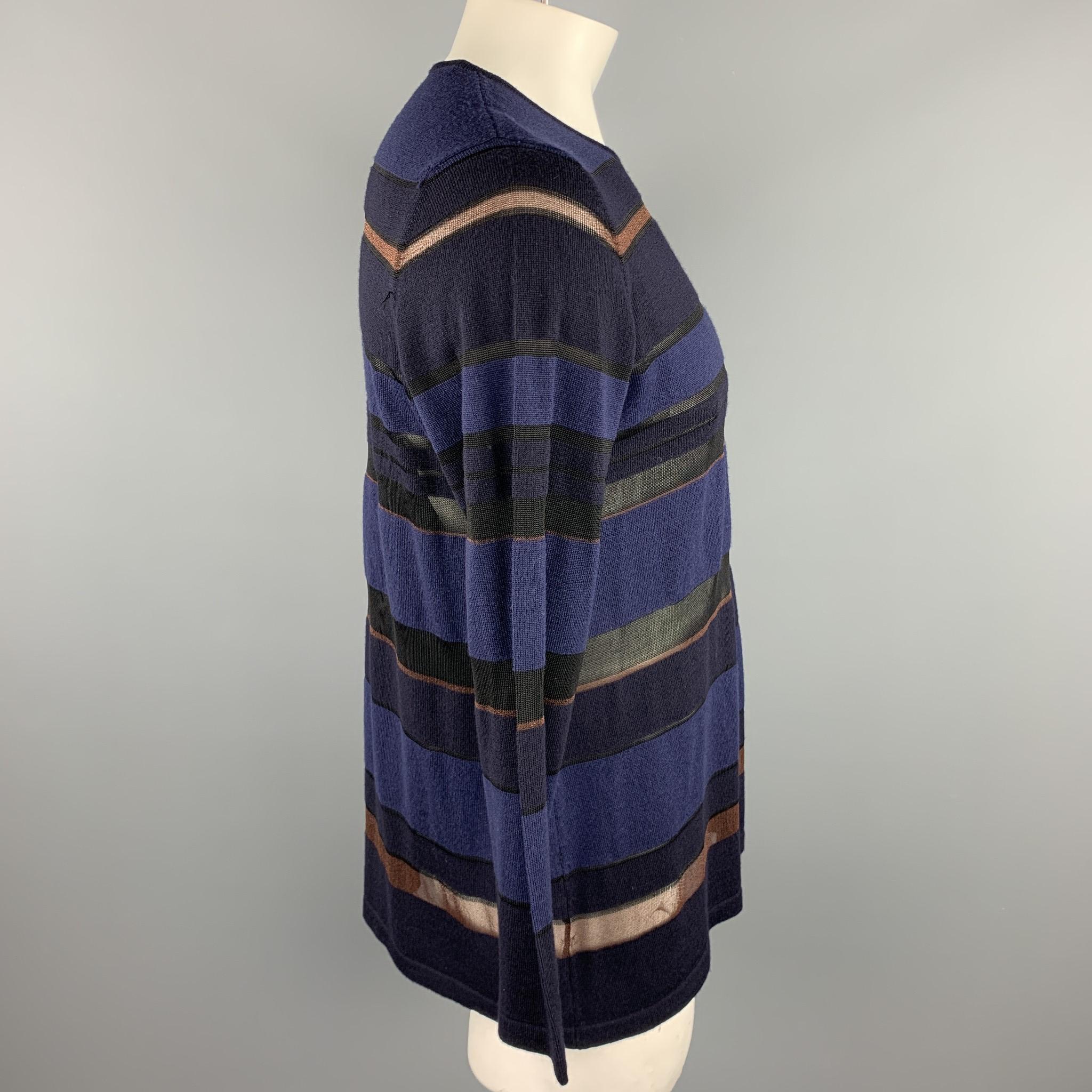 JAEGER pullover navy & black stripe wool blend featuring a crew-neck.

Excellent Pre-Owned Condition.
Marked: L

Measurements:

Shoulder: 17.5 in. 
Chest: 44 in. 
Sleeve: 25.5 in. 
Length: 29 in. 
