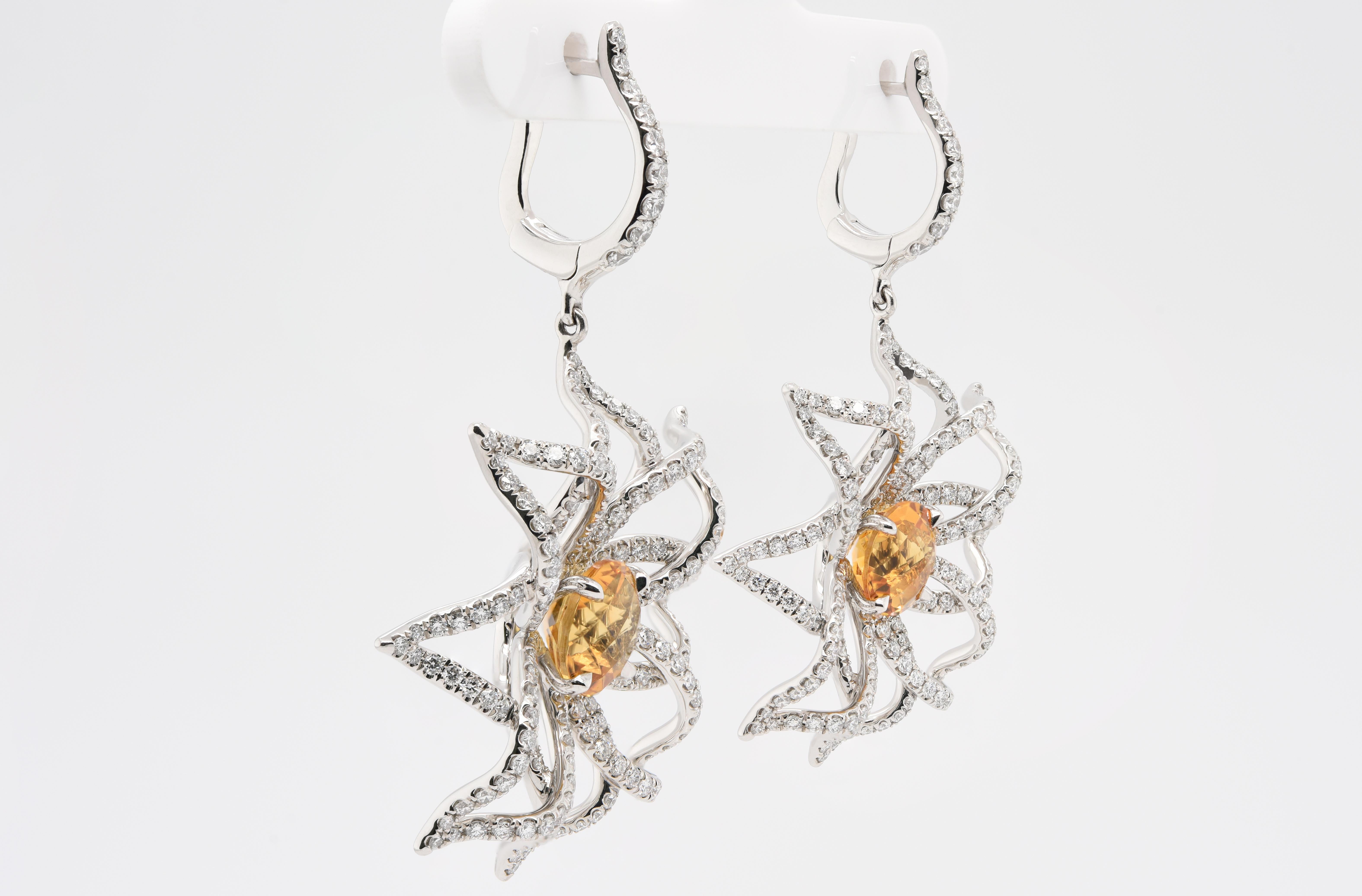 These amazing Citrine and Diamond Petal Earrings look like flower petals with the Citrine as the flower. There are 3.65 carats in Citrine and 418 diamonds for a total gemstone weight of 6.15 carats all designed in Platinum with lever-backs for