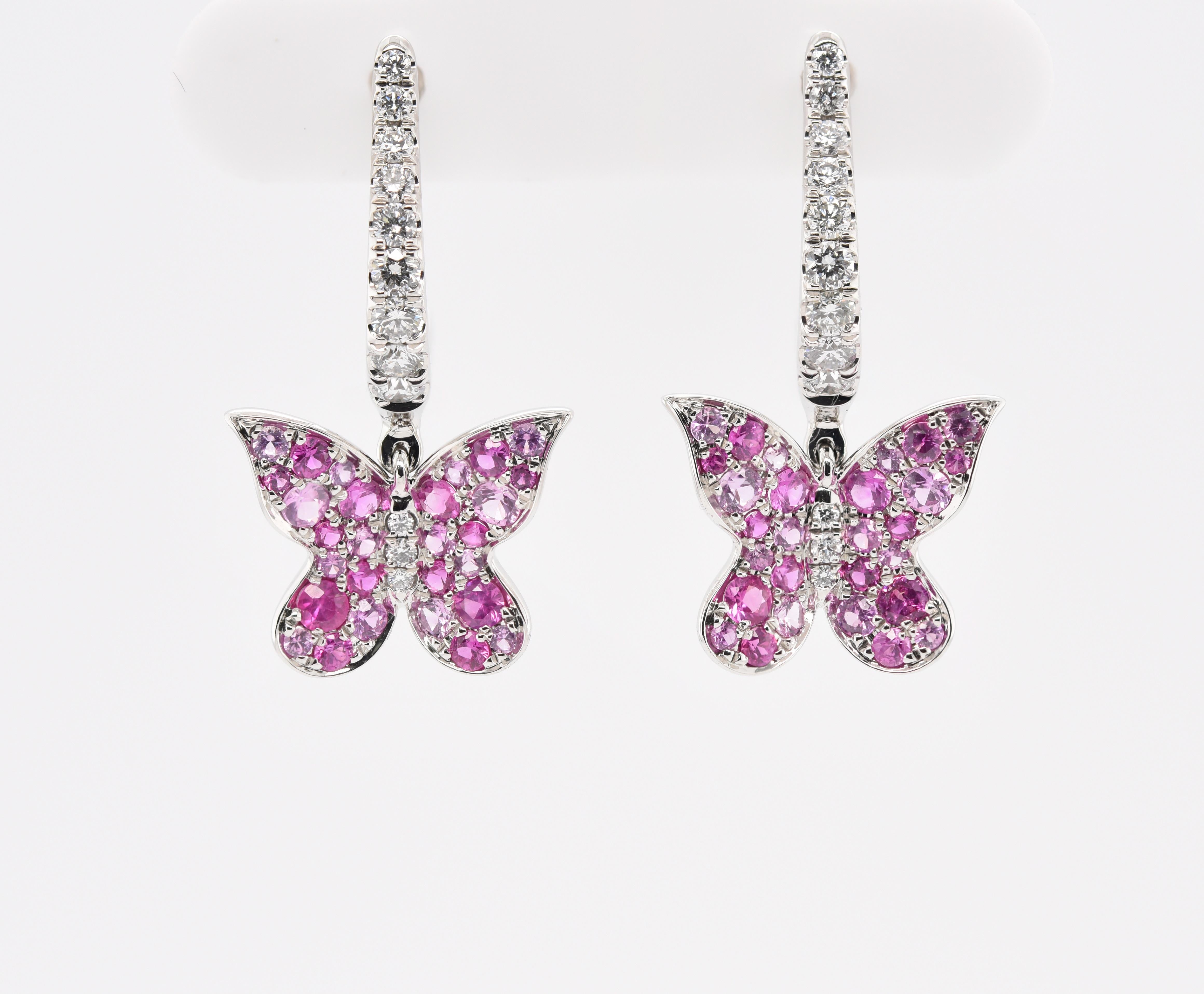 The hues of light and medium Pink Sapphires covered the wing of the butterfly while the thorax and the rest of the earring is comprised of diamonds. The Pink Sapphires have a total gem weight of over 1 carat and the diamonds are over 40 points for a