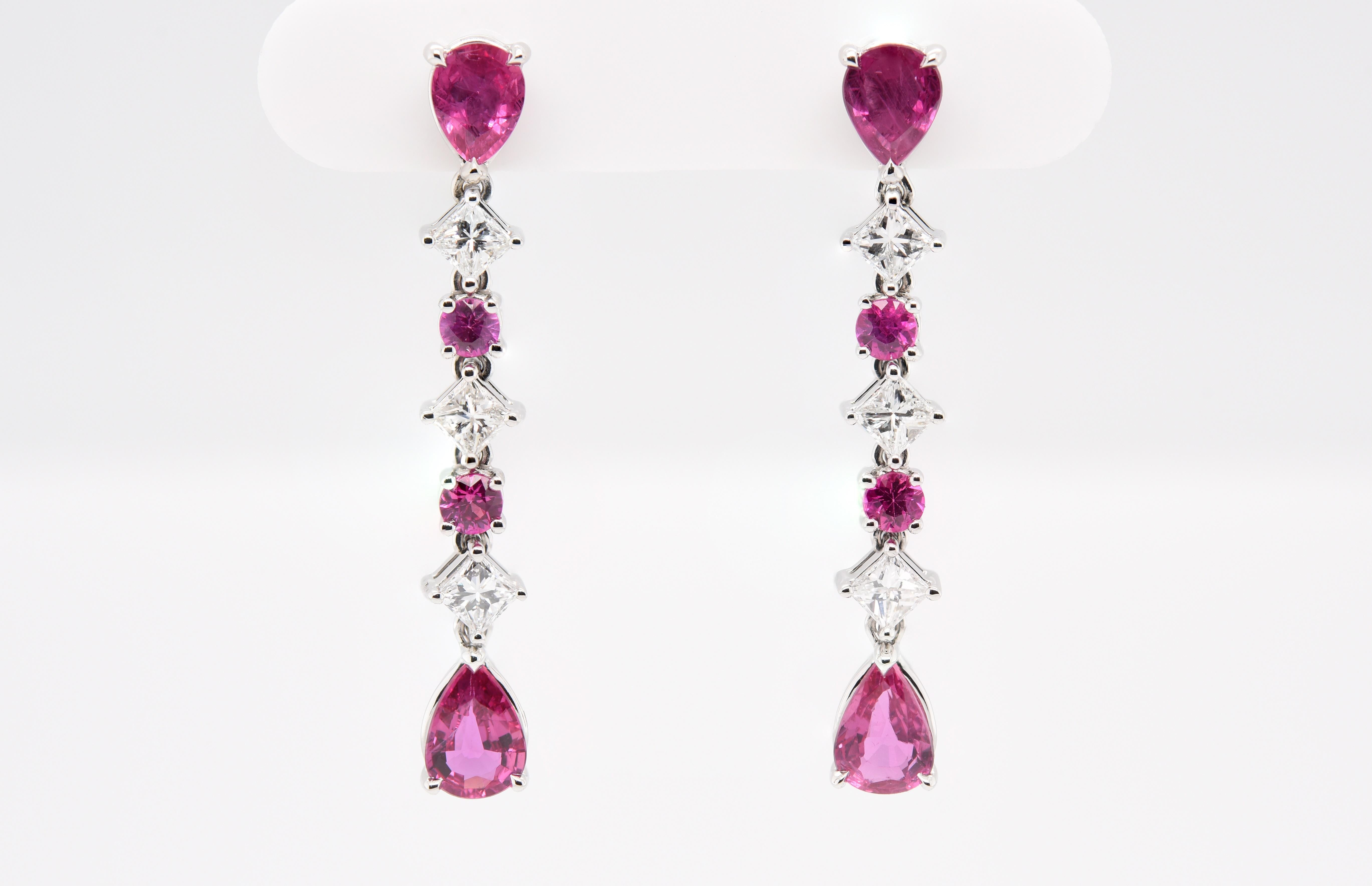 A beautiful alternating pattern of rubies and diamonds. There are four pear shaped Rubies along with four round Rubies for a total gem weight of 1.85 carats with four square (Princess Shape) Diamonds weighing over .50 carats for a total gem weight