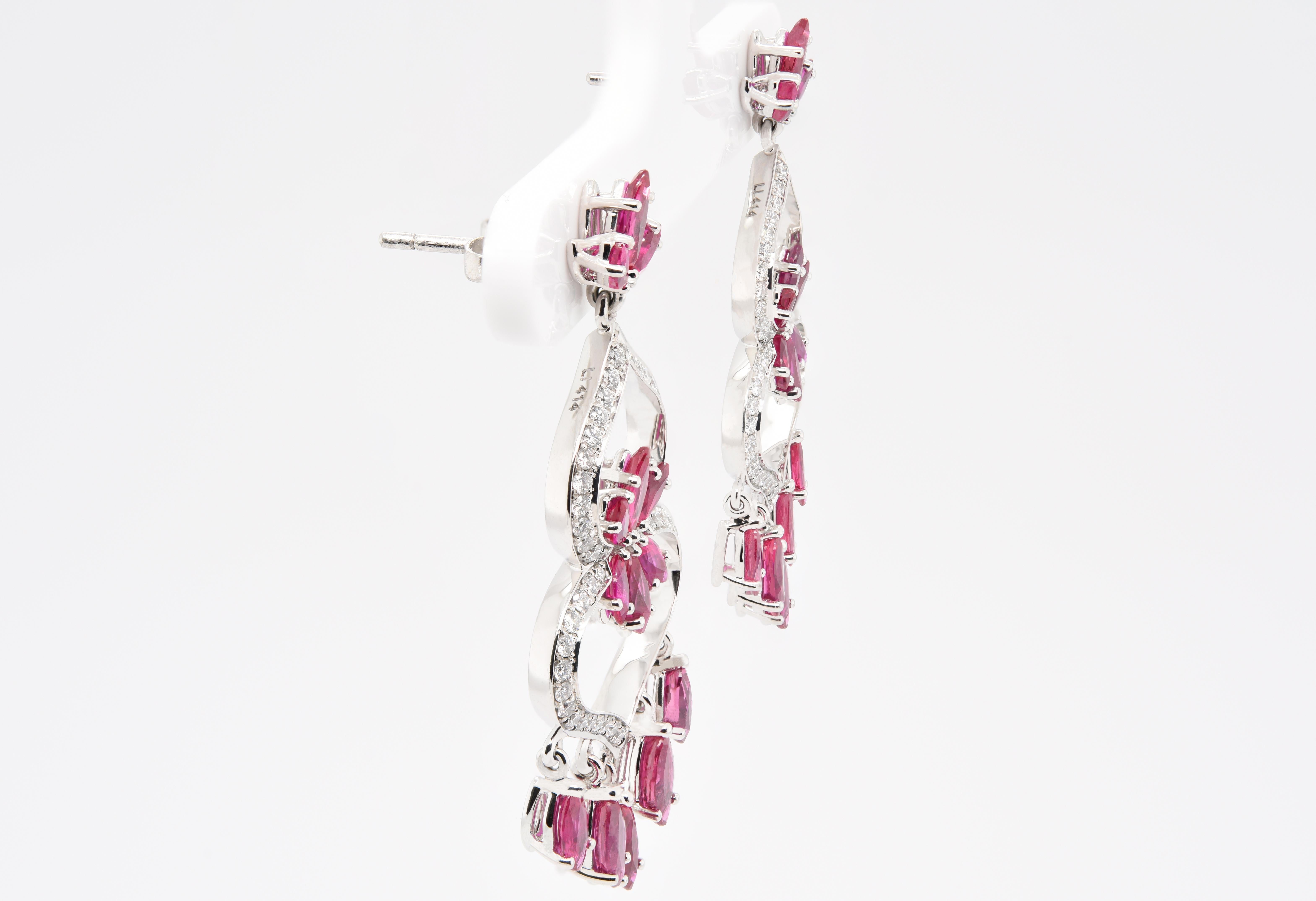 JAG New York created for you these ruby and diamond earrings that is comprised of 5.75 carats total gemstone weight of rubies and diamonds set in platinum.  

Unapologetic self-expression through jewelry. JAG New York's world class designs does just