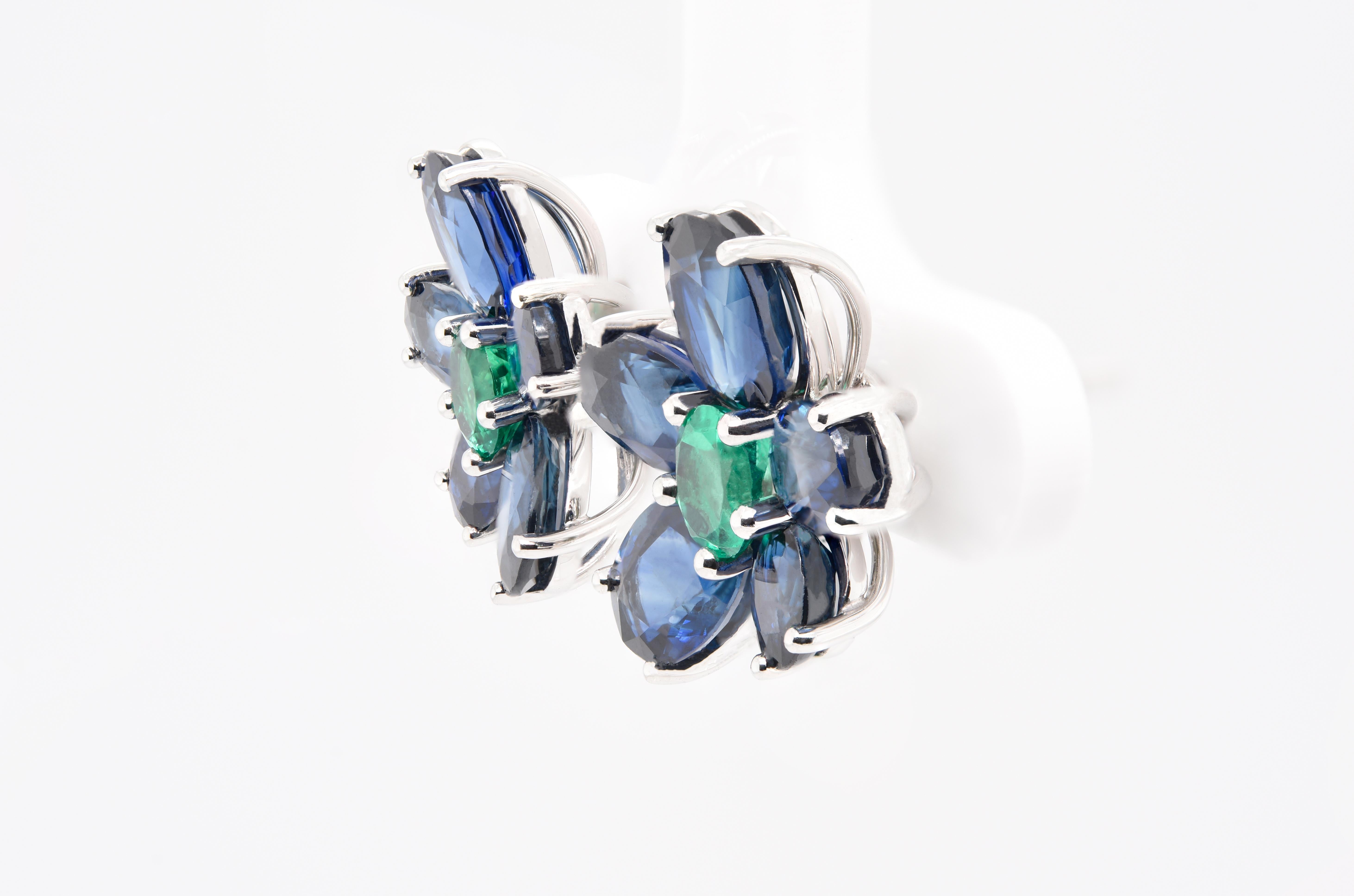 Plumbago Earrings	Described as the flower plumage which is blue sapphires with green emeralds as the center. With oval sapphires, round emeralds and a combined total gemstone weight of over 8.50 carats and mounted in Platinum these earrings are a