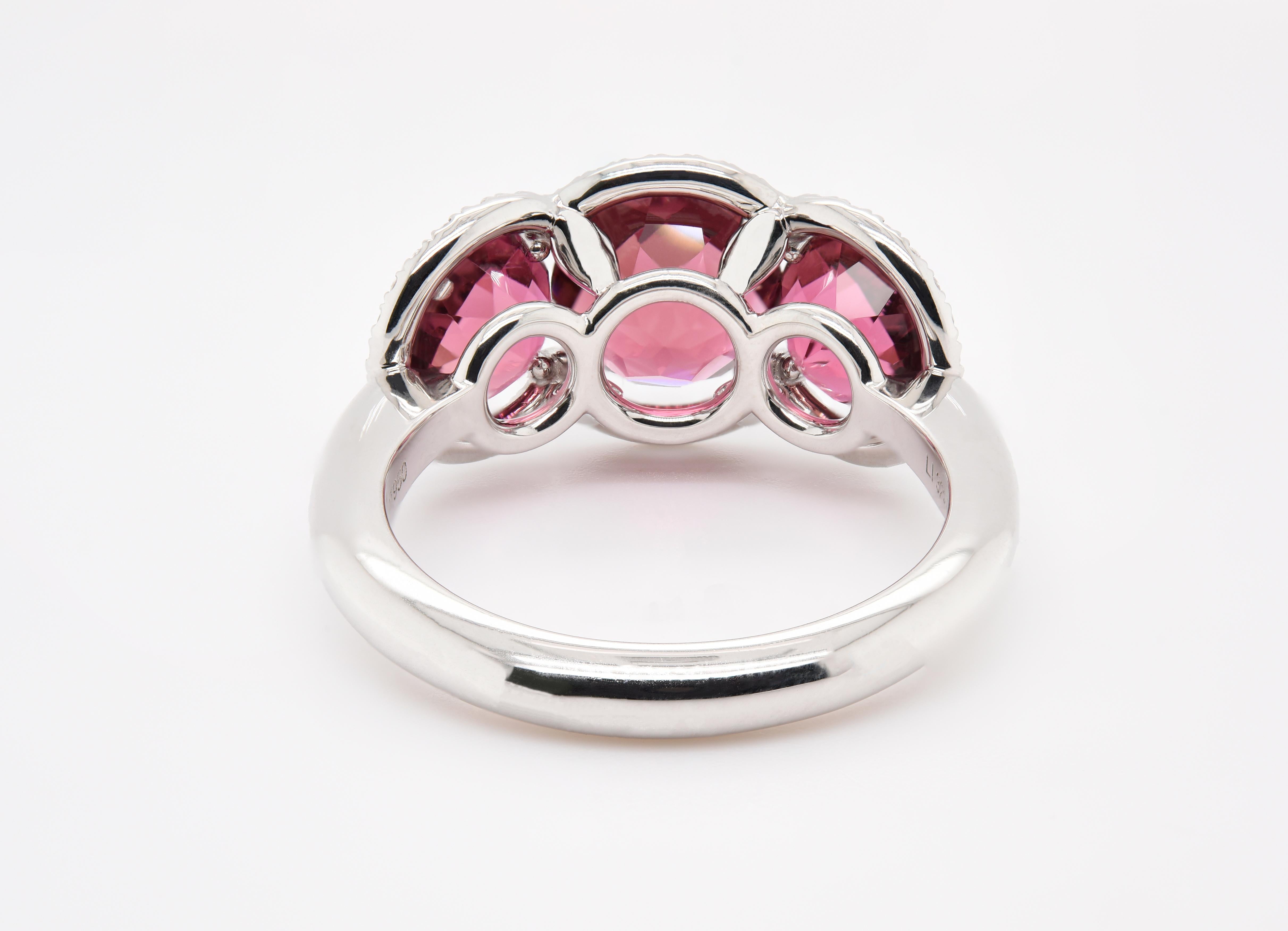 Artist JAG New York Three Pink Tourmalines Surrounded by Diamond halos Ring in Platinum For Sale