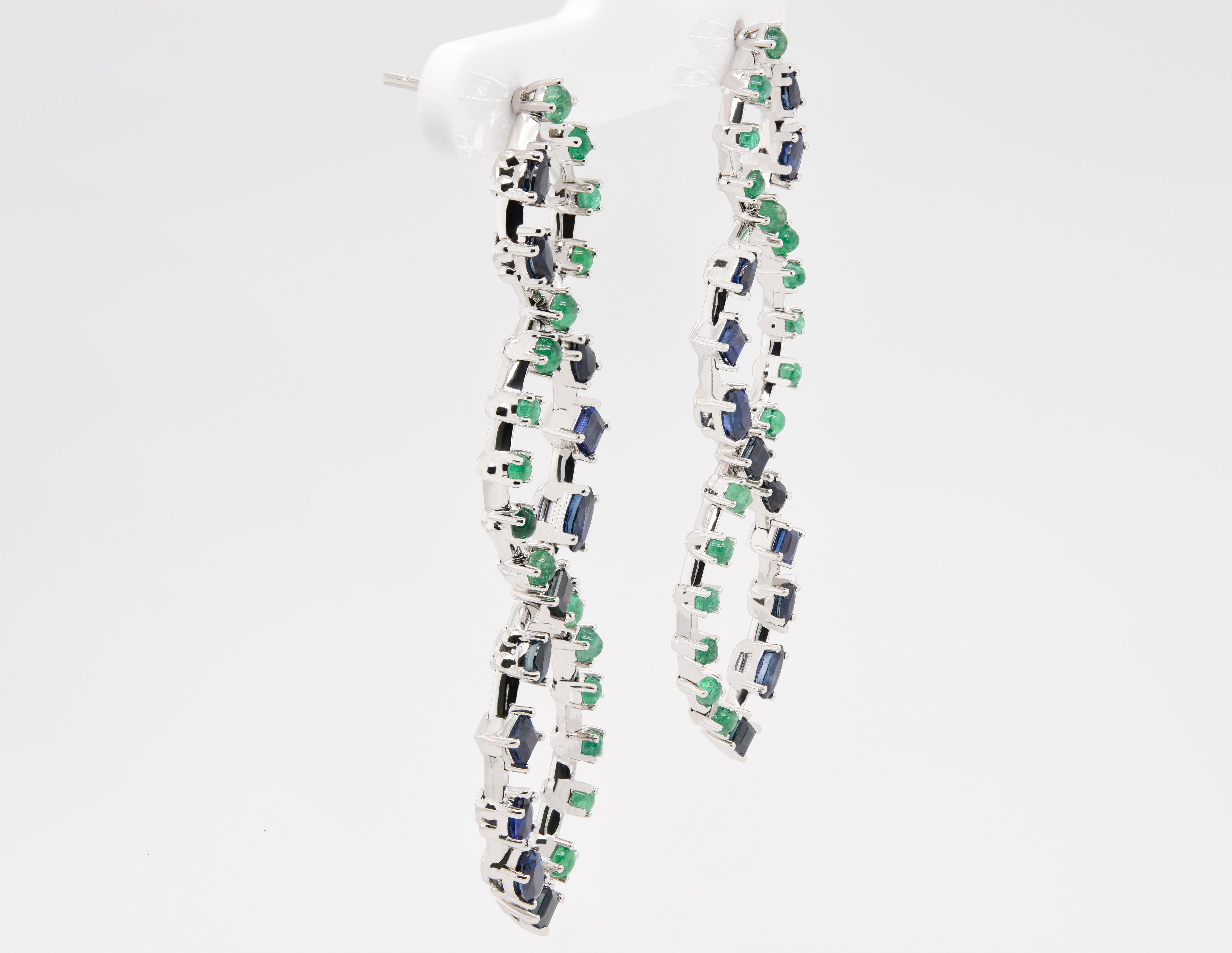 JAG New York created for you these wave, drop earrings are alternating sapphires with emeralds that is comprised of 5.75 carats total gemstone weight in platinum.  

Unapologetic self-expression through jewelry. JAG New York's world class designs