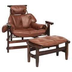 Fauteuil Jaganda avec repose-pieds par Jean Gillon