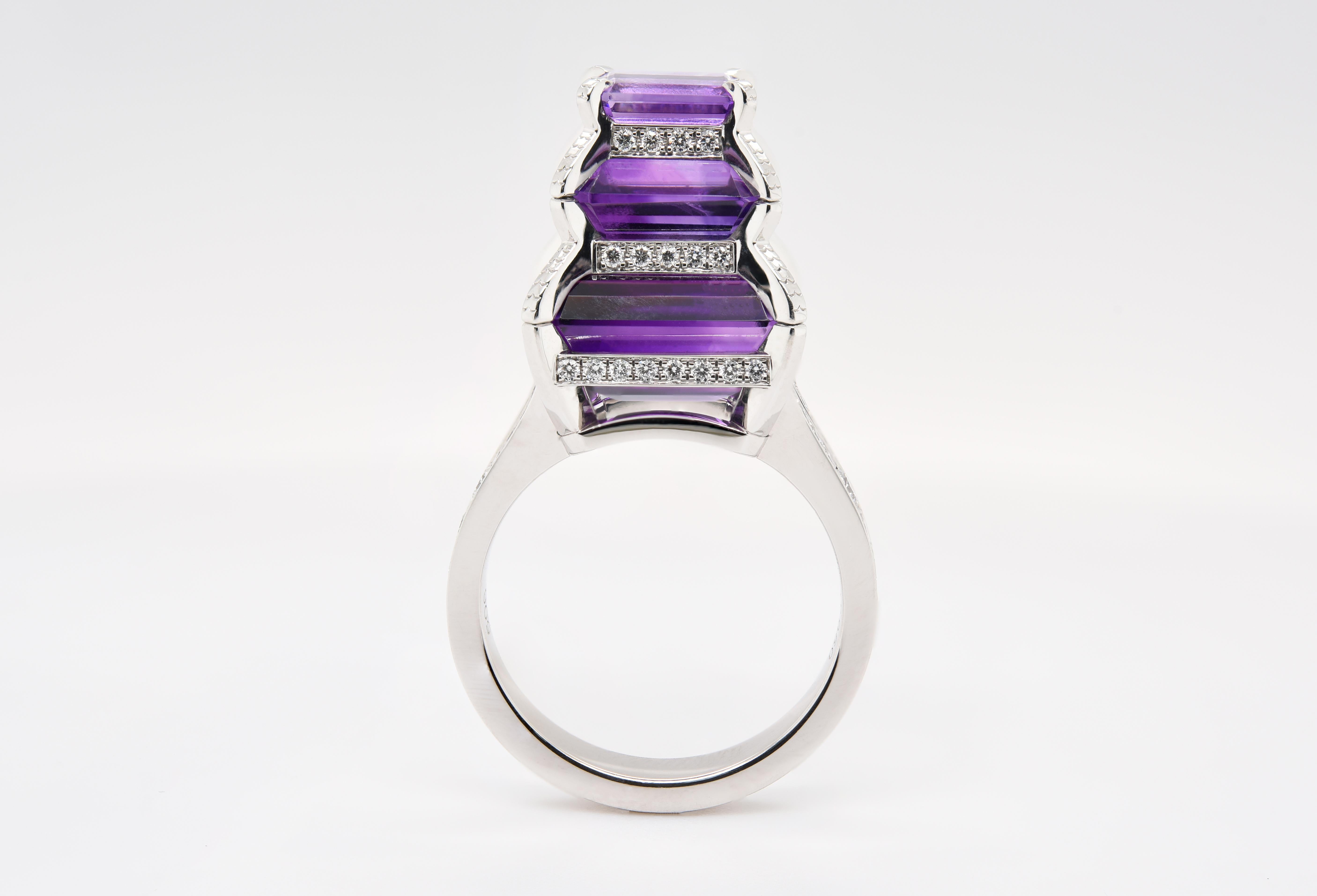 This unique Diamond and Emerald Shaped Amethyst Temple Ring is an inspiration from temples found in Asia. With 7.75 carats in Amethyst and 76 diamonds and a total gemstone weight of over 8.25 carats all in platinum you will most definitely be the