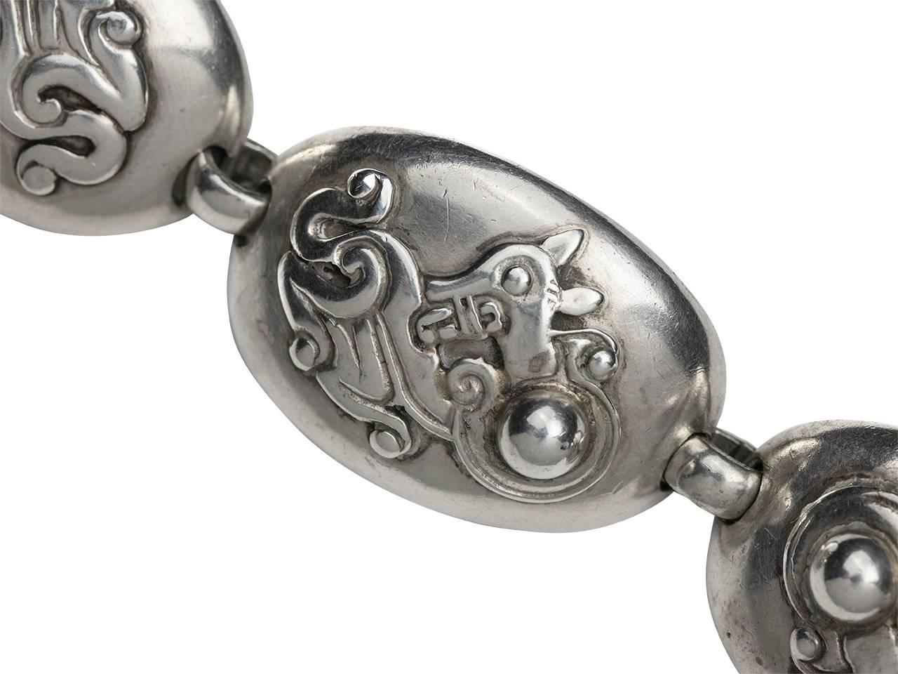 Sterling Silver link bracelet with Jaguar motif. Signed, and maker’s mark.