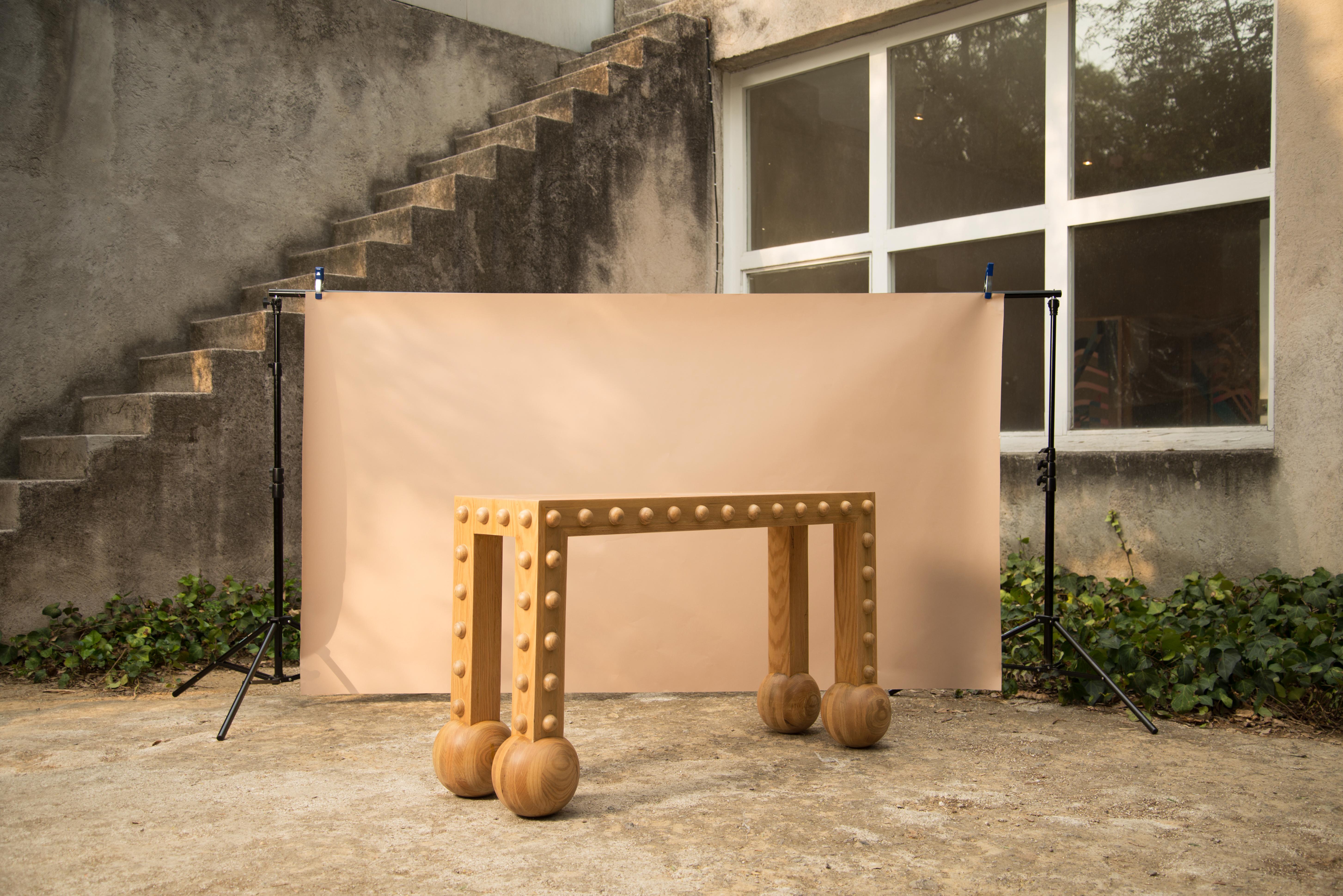 Jaguarcito console table by Andres Gutierrez.
Dimensions: D35 x W120 x H75 cm.
Materials: Solid white oak.
Available in natural or black lacquer finish.

— Inspired by the jaguar—
In the Aztec civilization, the jaguar was worshiped as a deity;