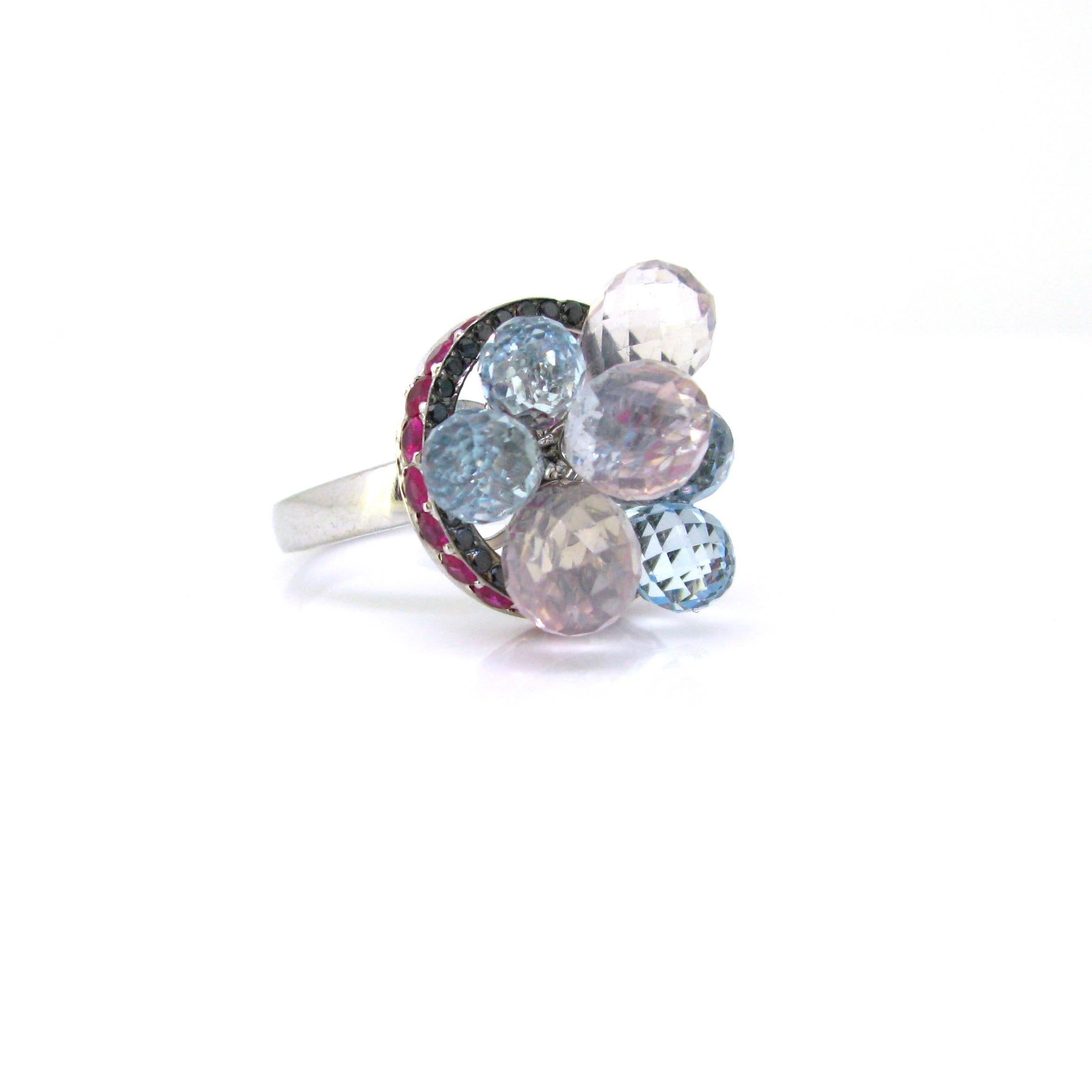 Weight:	15,26gr

Metal:	18kt white gold

Condition:	New

Stones:	3 Pink Quartz
	4 Aquamarines
•	Cut:	Briolette
	
Others:	21 round cut rubies
•	Total carat weight:	2ct approximately
	
	35 round cut black diamonds
•	Total carat weight:	0.30ct