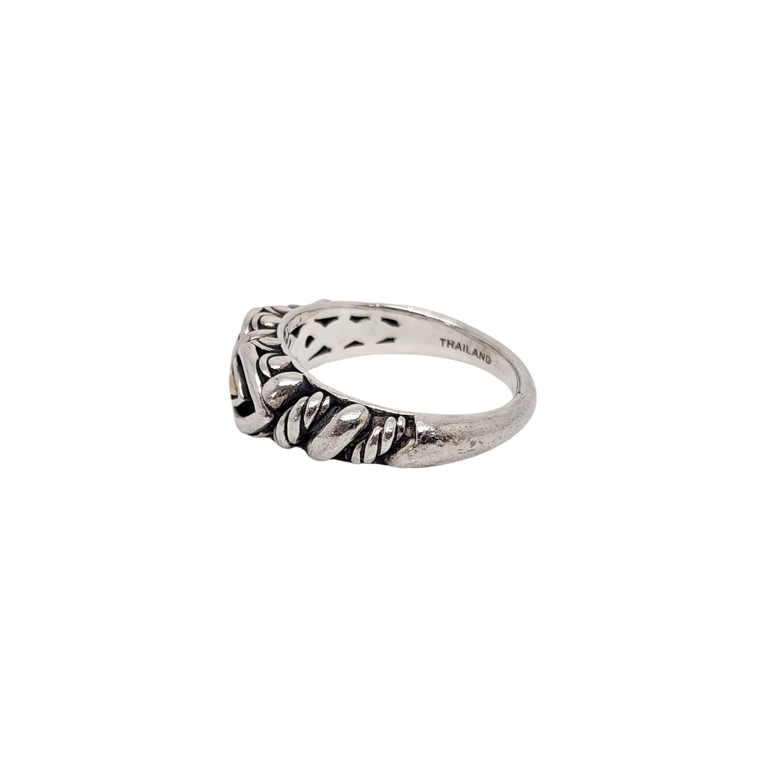 JAI by John Hardy sterling silver 14K yellow gold teardrop band ring.

Size 6 1/2

From the affordable line JAI by John Hardy for QVC, this band ring features 2 teardrop yellow gold accents on a smooth and textured woven design setting.

Measures