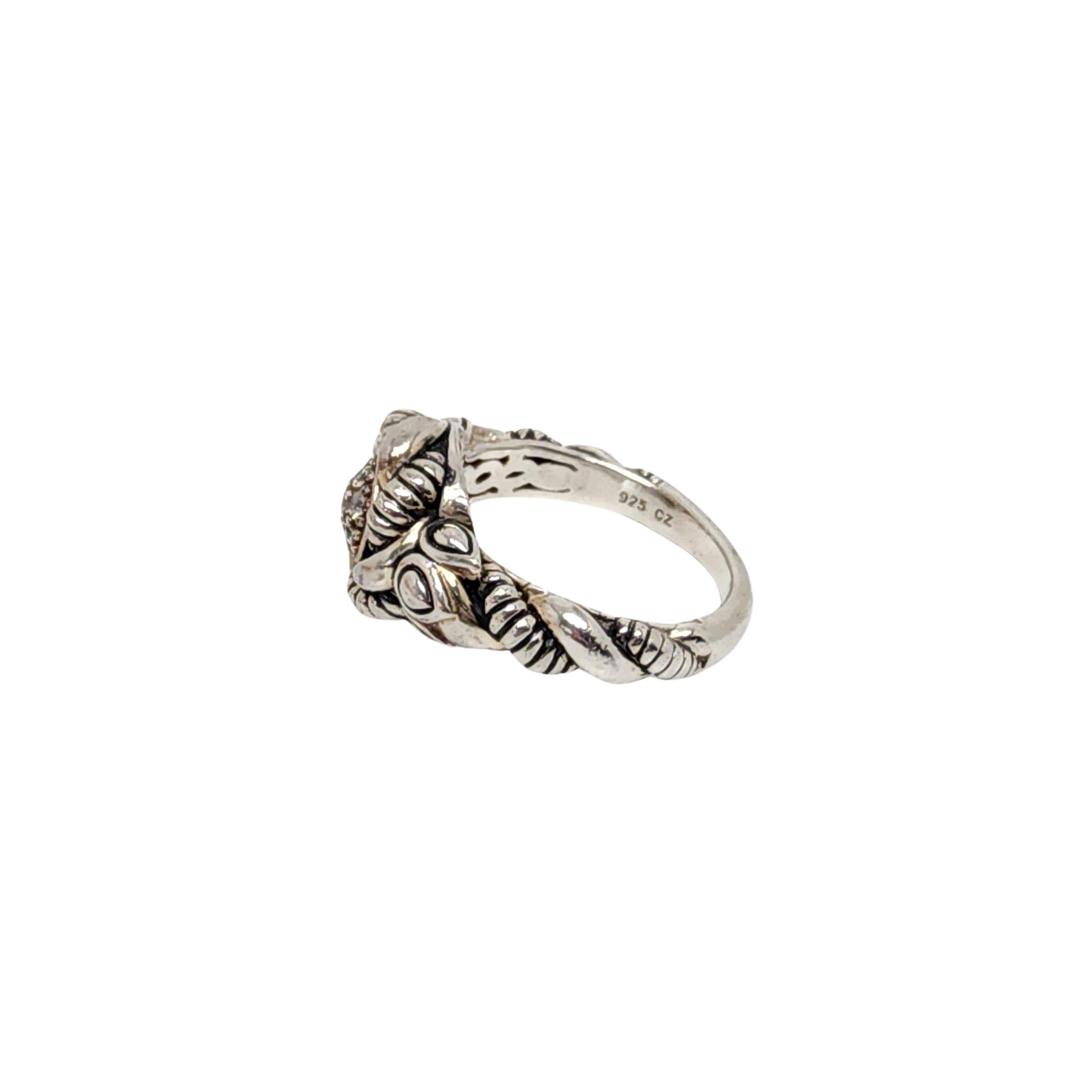 JAI by John Hardy sterling silver clear CZ ring.

Size 7

From the affordable line JAI by John Hardy for QVC, this ring features a circle of pave small round CZs stones with alternating smooth and textured woven design.

Measures approx 1/2
