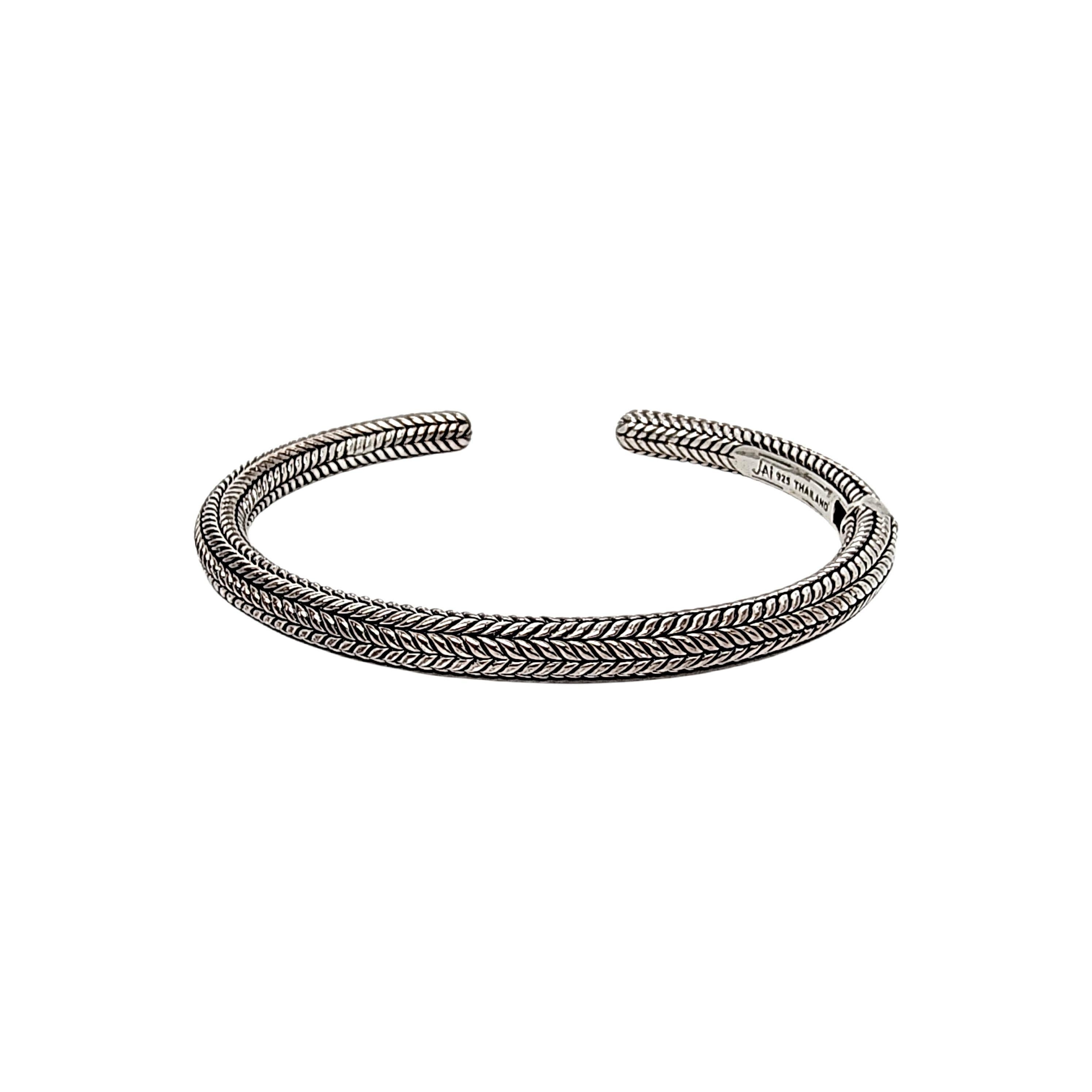 Sterling silver woven hinged cuff bracelet by JAI for John Hardy.

From the affordable line JAI by John Hardy for QVC, this cuff bracelet features a hinge for easy on and off and woven wheat-like design.

Measures approx 6 3/4