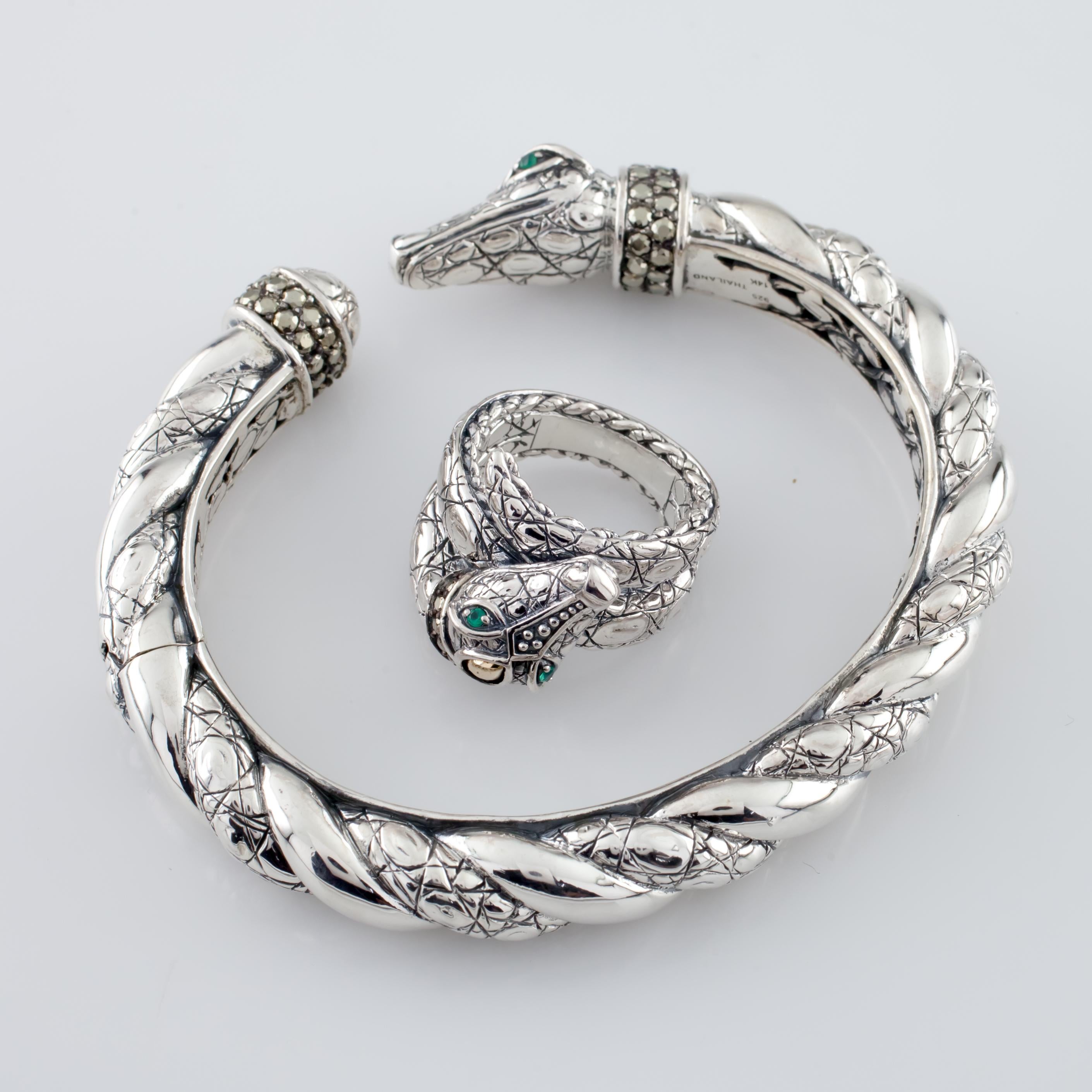 Gorgeous John Hardy Croco Cuff
Features Croco Head w/ Hematite & 18k Yellow Gold Accents and Emerald Eyes
Inner Circumference (Wrist Fit) = 6.75