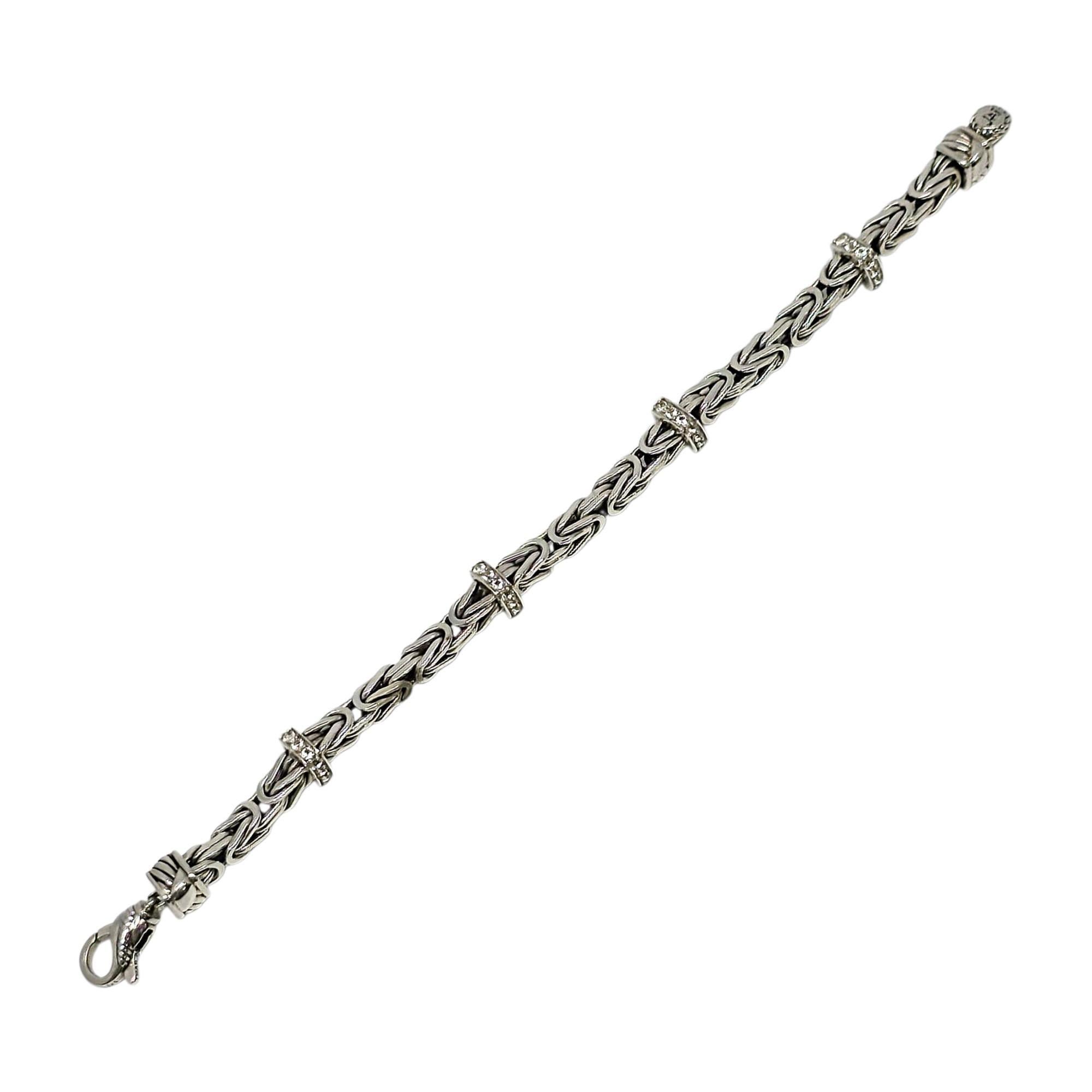 JAI sterling silver byzantine chain pave white topaz station bracelet.

This beautiful sterling silver byzantine bracelet features 3 pave set white topaz stations. Sukhothai twist lobster claw closure.

Measures approx 6 3/4
