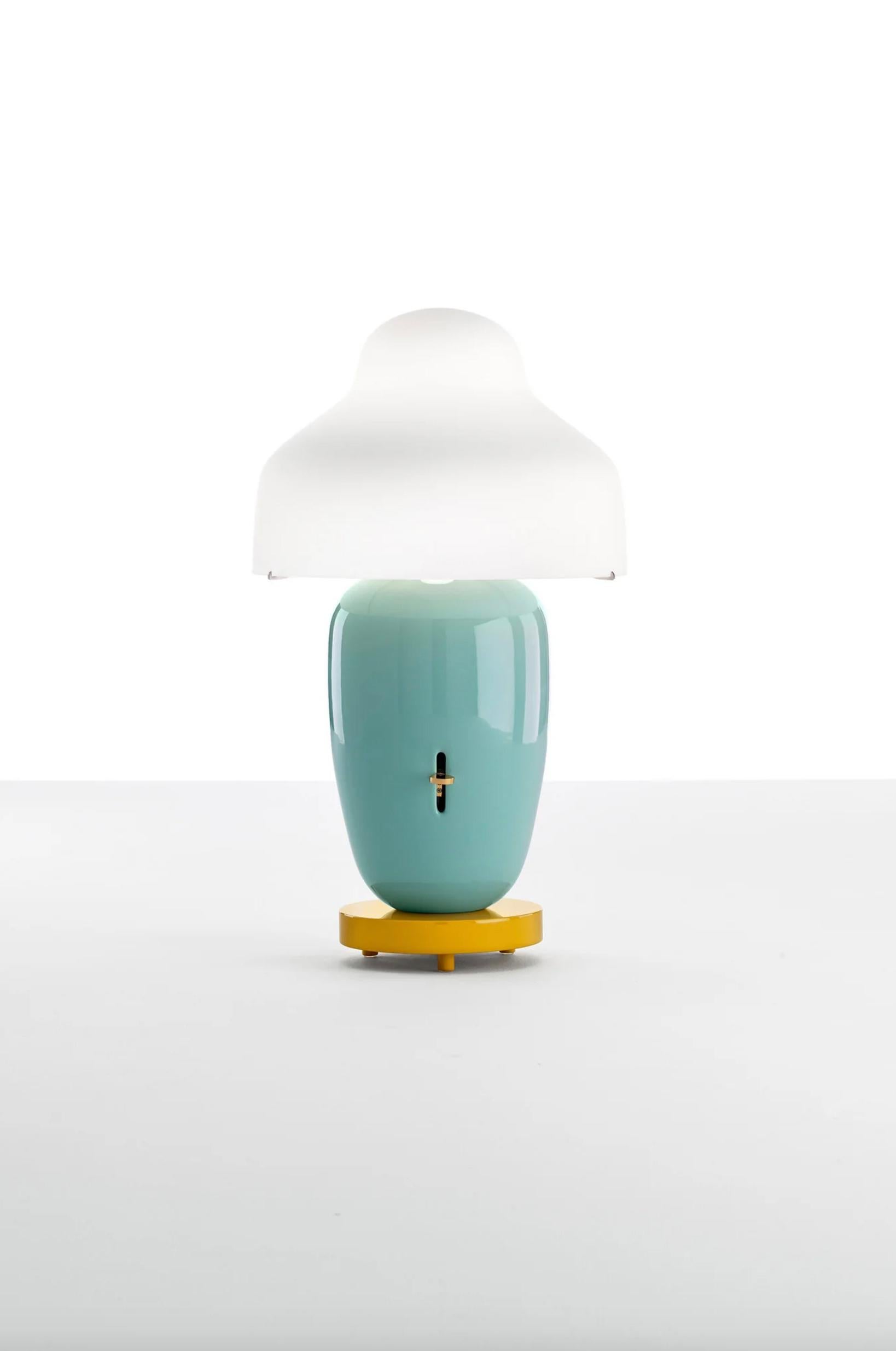 Jaime hayan Chinoz Black-Burgundy Base Table Lamp For Parachilna 

Asian inspired table lamp. Consisting of a mouth-blown diffuser, ceramic body and a lacquered wooden base. The design invites for color and finish combinations.

Product