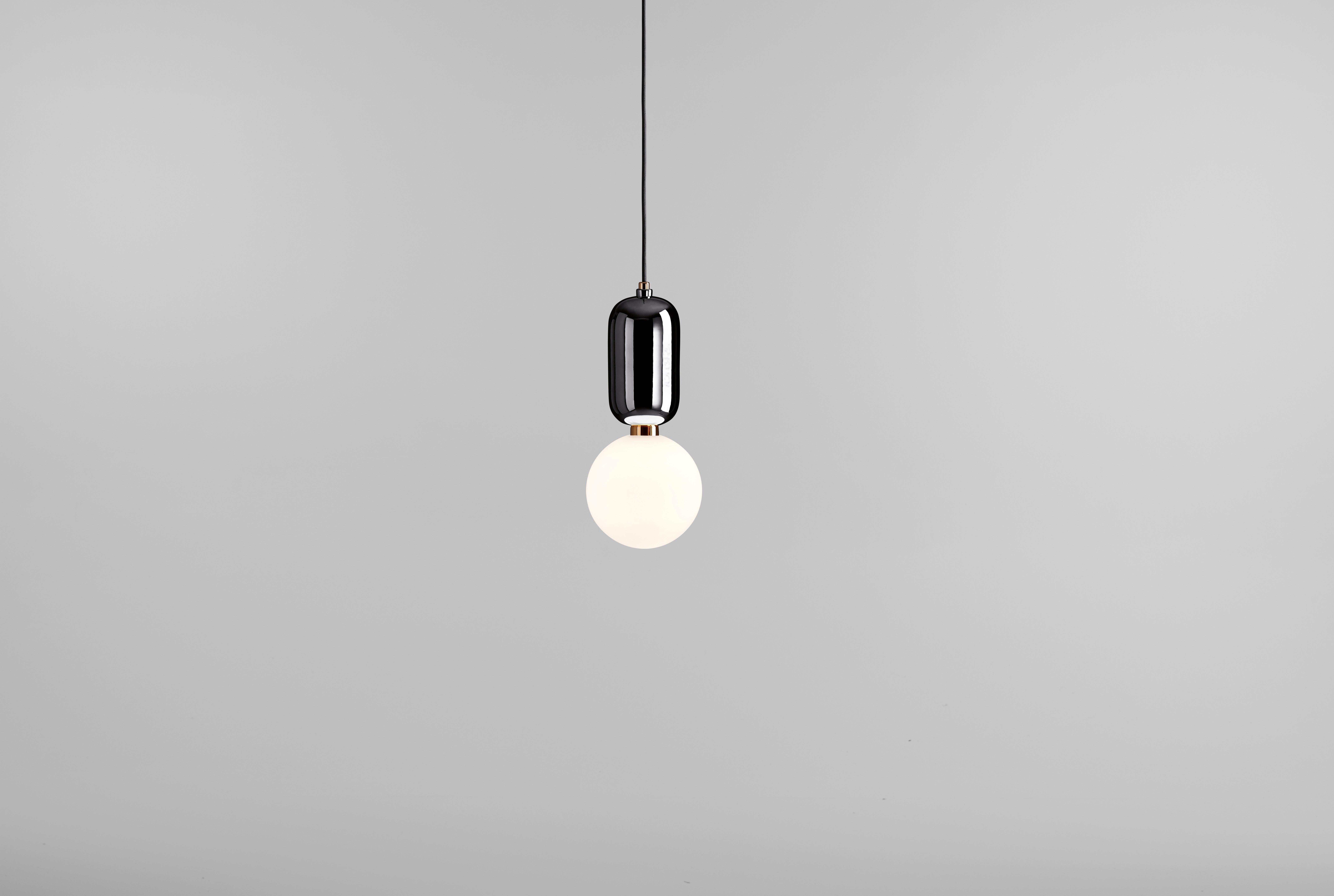 Suspension lamp, model Aballs T PE, designed by Jaime Hayon in 2013.
Manufactured by Parachilna.
Handmade ceramic body and blown opal matt glass diffuser. 
Base is also available in white, black, golden, copper or platinum ceramic. 


Shiny and