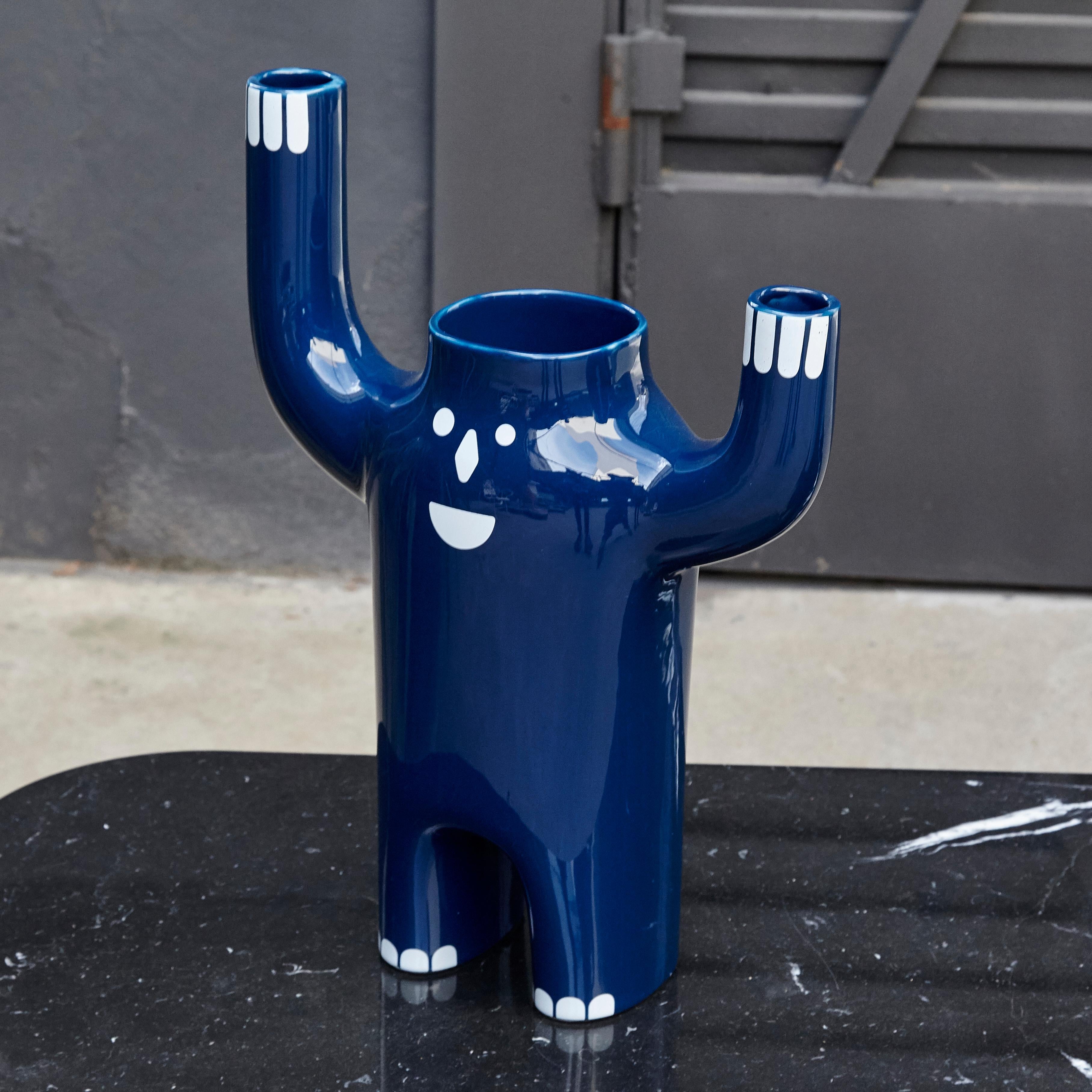 Contemporary Happy Susto vase by Jaime Hayon.
Manufactured by BD Barcelona (Spain).

Glazed ceramic vase in blue with decorations in white.

Measures: 
14 D x 33 W x 47 H cm.
 