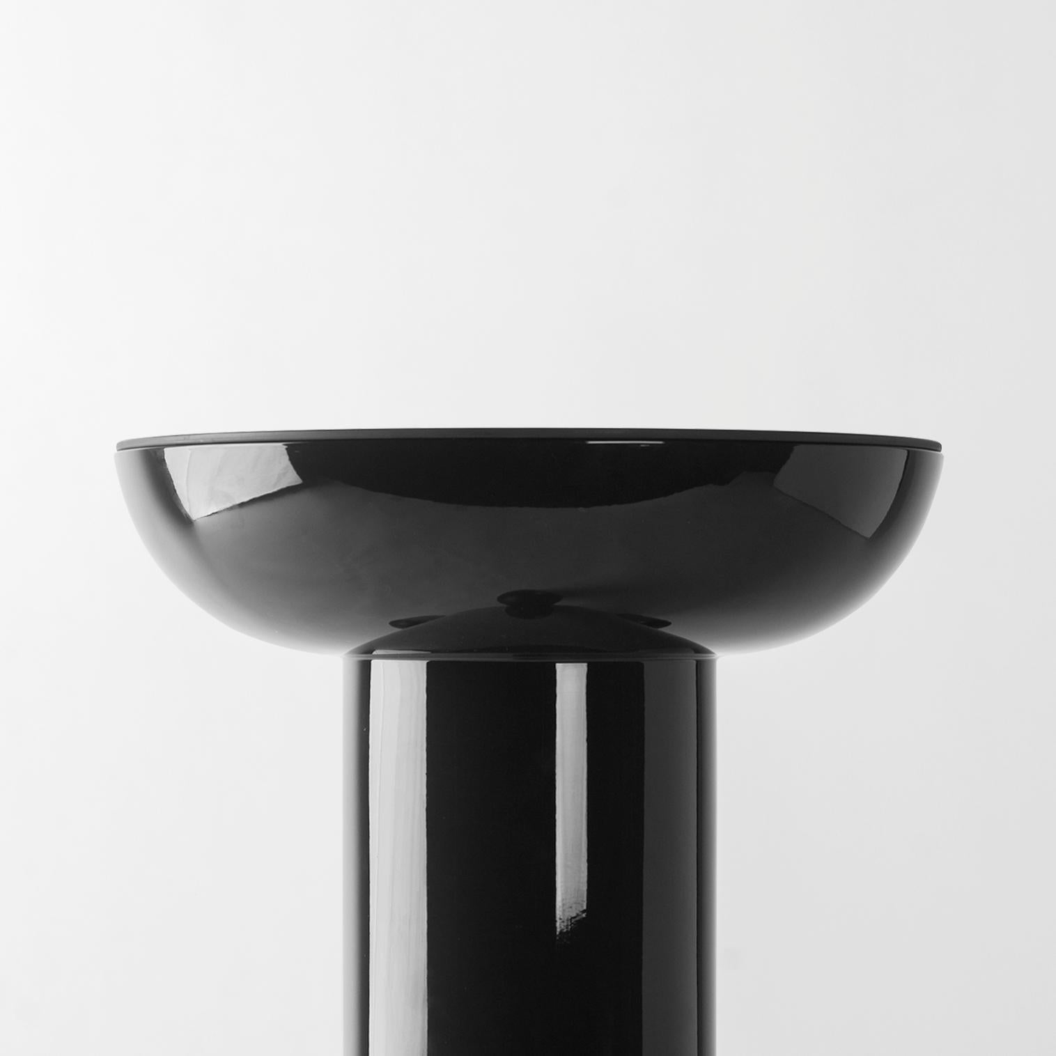 Dark Grey Explorer #03 table

Design by Jaime Hayon, 2019
Manufactured by BD Barcelona.

Laquered fibreglass body. Solid turned wooden legs and lacquered. Painted glass table top.

Measures: 40 Ø x 50 cm

- Glass: RAL 7021
- Body: RAL 7021