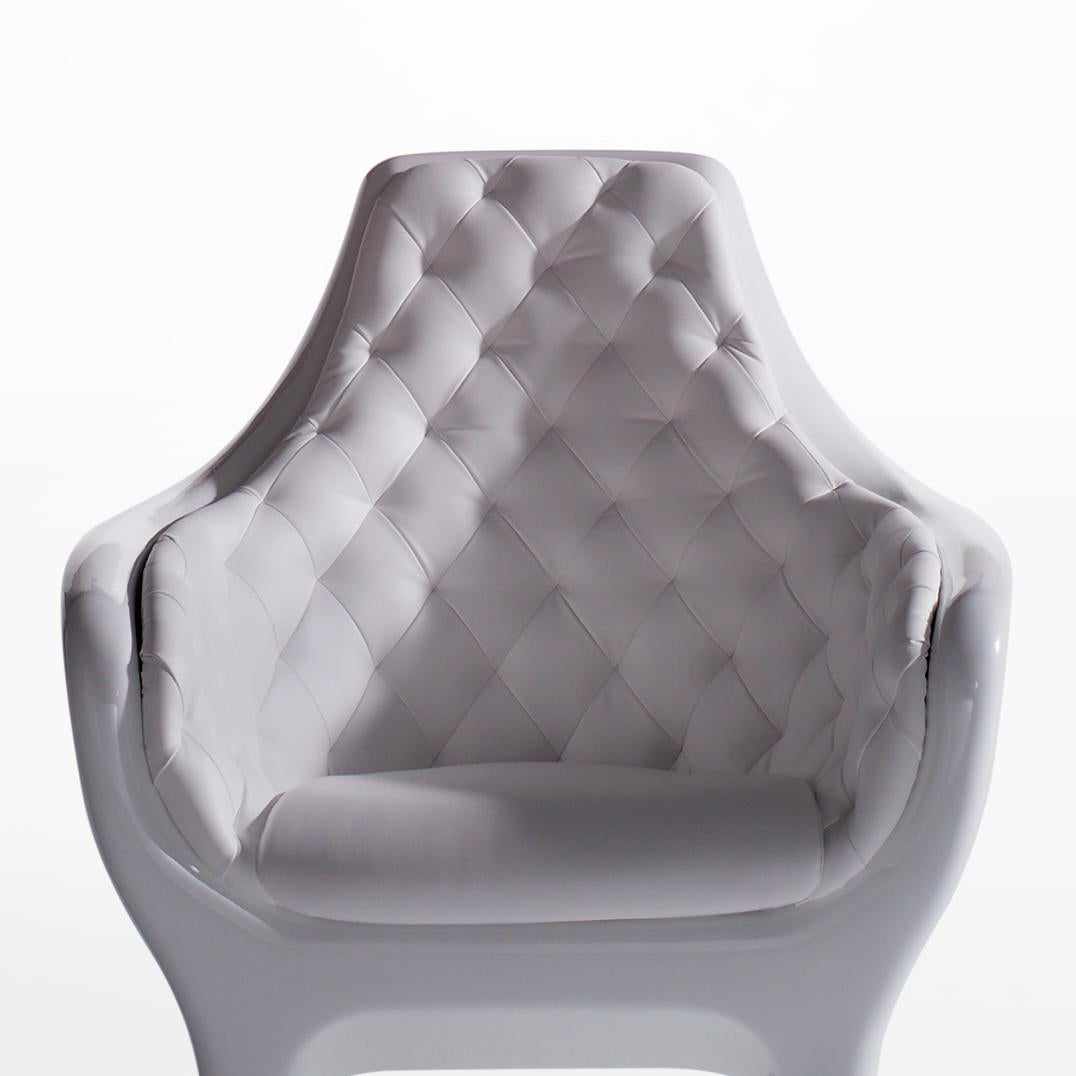 Armchair designed by Jaime Hayon manufactured by BD.

In rotomoulded polyethylene. Upholstered in leather capitoné and bright lacquered.
 