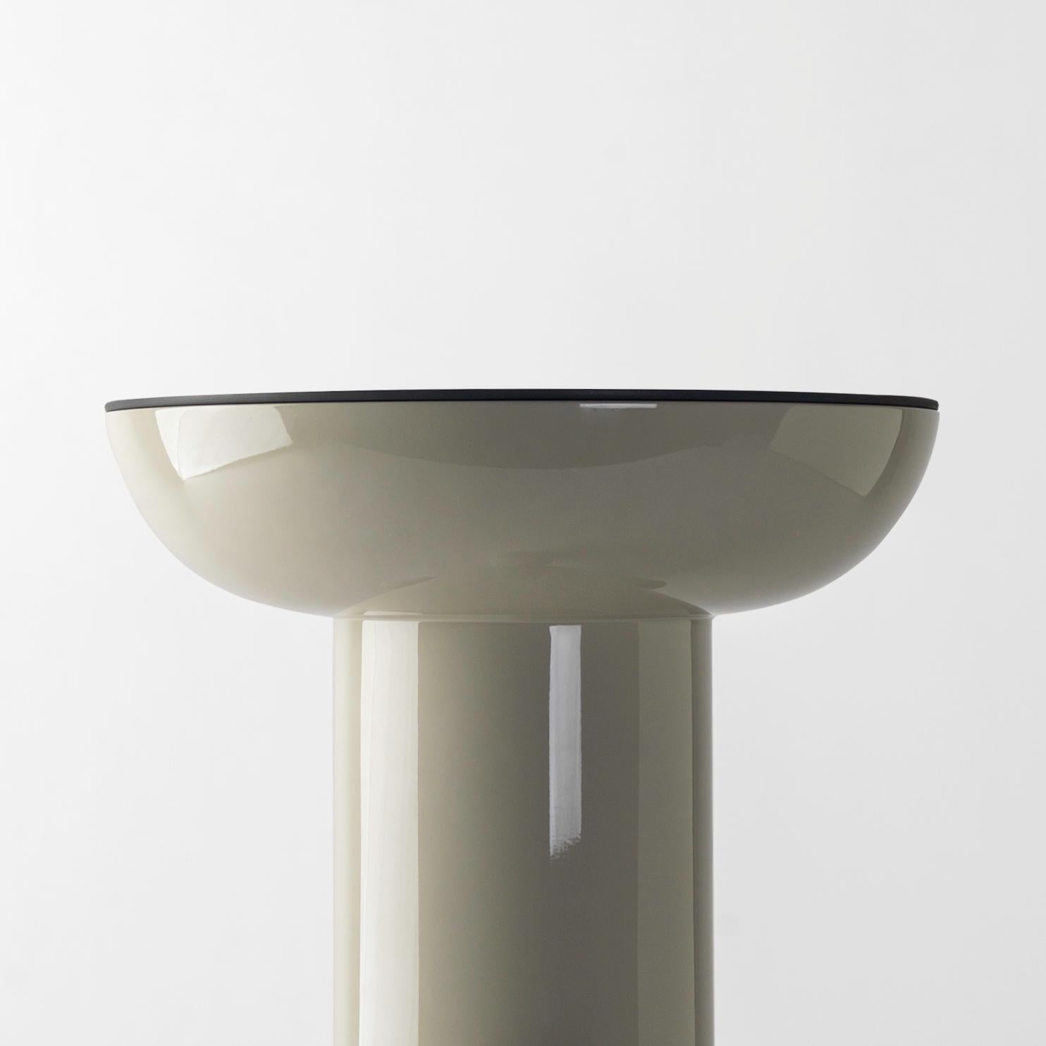 Light grey explorer #03 table

Design by Jaime Hayon, 2019
Manufactured by BD Barcelona.

Lacquered fibreglass body. Solid turned wooden legs and lacquered. Painted glass table top.

Measure: 40 Ø x 50 cm

- Glass: RAL 7044
- Body: RAL