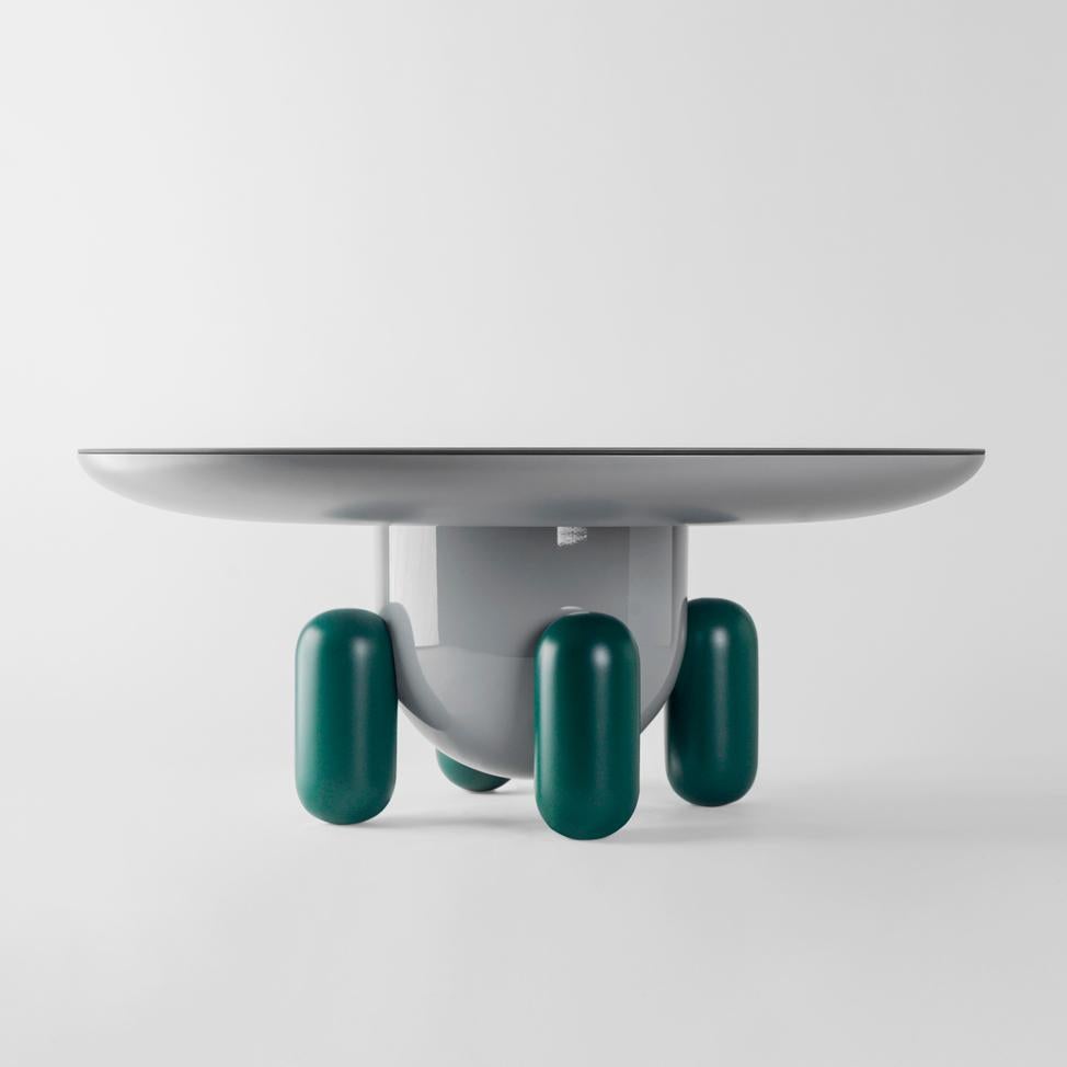 Multi-color explorer #03 table

Design by Jaime Hayon, 2019
Manufactured by BD Barcelona.

Laquered fibreglass body. Solid turned wooden legs and lacquered. Painted glass table top.

Measures: 100 Ø x 42 cm

- Glass: RAL 7021
- Top: RAL